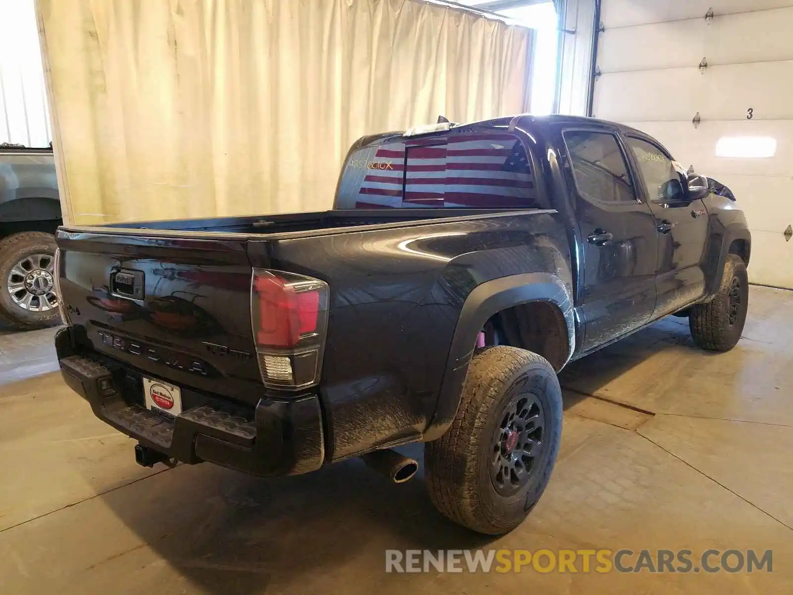 4 Photograph of a damaged car 5TFCZ5AN1KX188323 TOYOTA TACOMA 2019