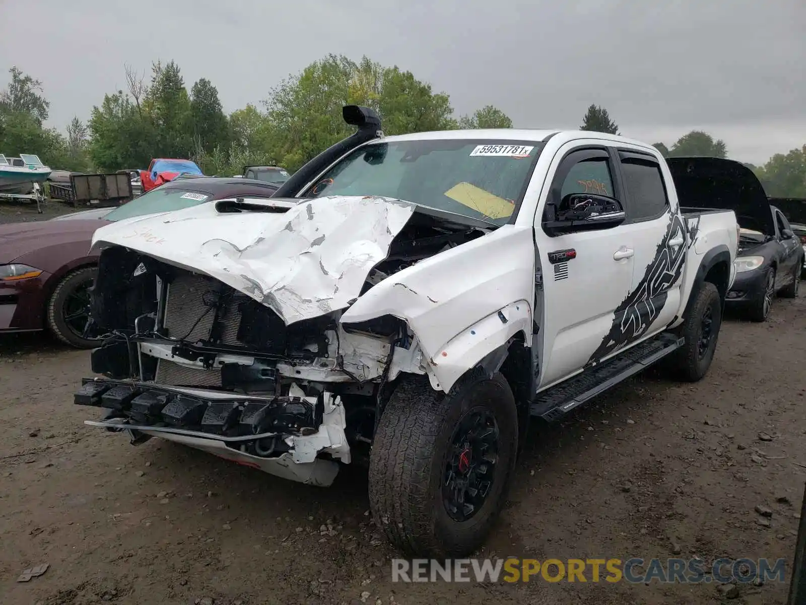 2 Photograph of a damaged car 5TFCZ5AN1KX188998 TOYOTA TACOMA 2019