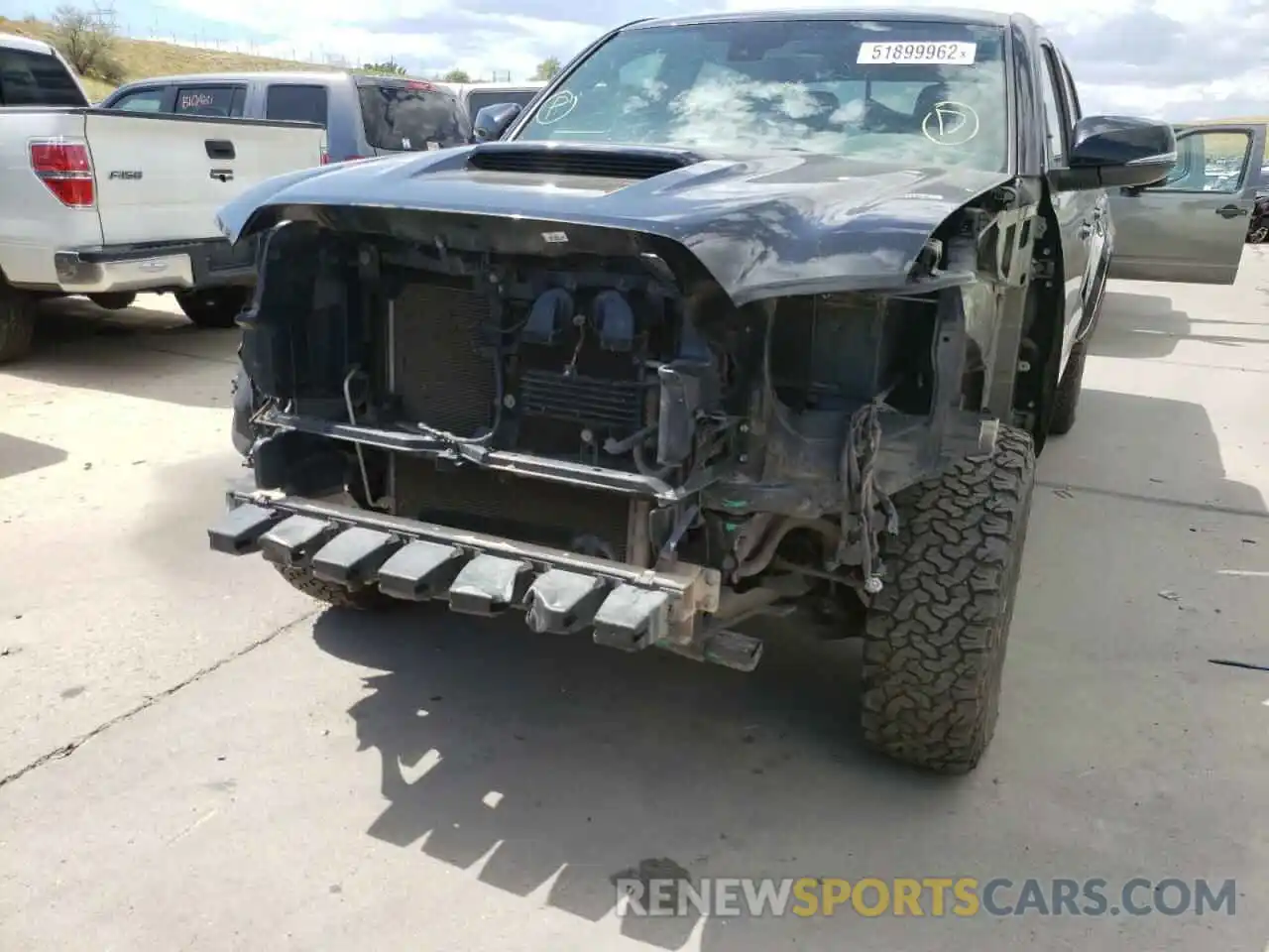 9 Photograph of a damaged car 5TFCZ5AN1KX189973 TOYOTA TACOMA 2019