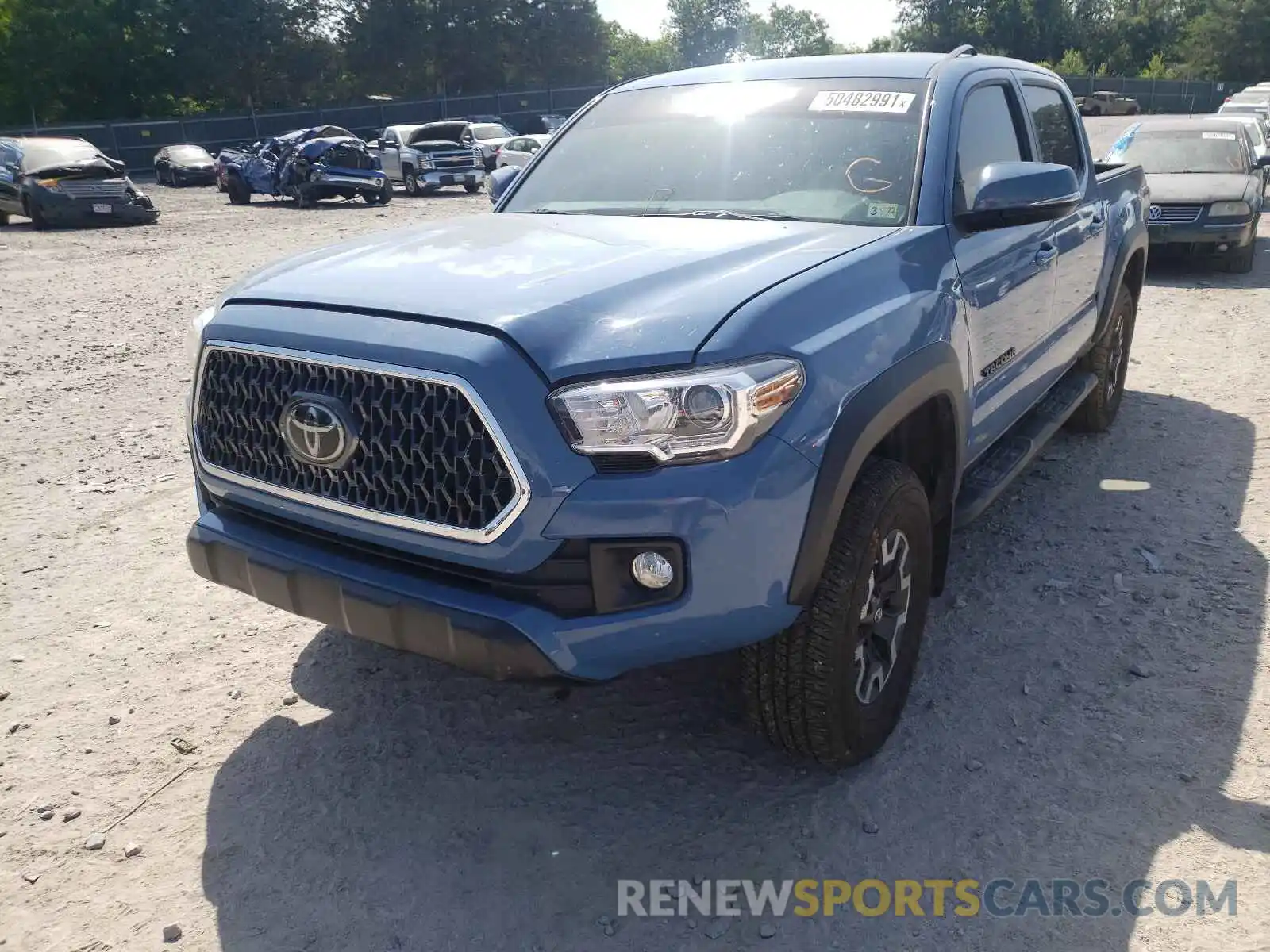 2 Photograph of a damaged car 5TFCZ5AN1KX190783 TOYOTA TACOMA 2019