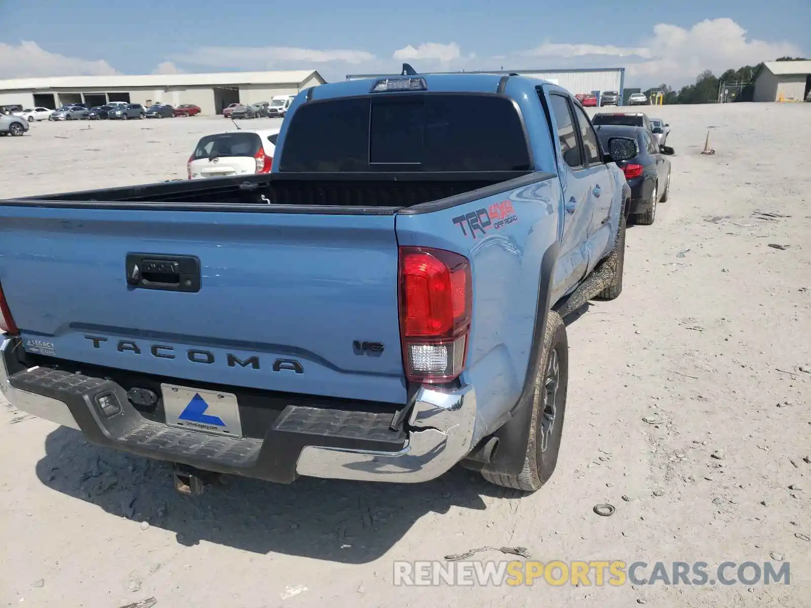 4 Photograph of a damaged car 5TFCZ5AN1KX190783 TOYOTA TACOMA 2019