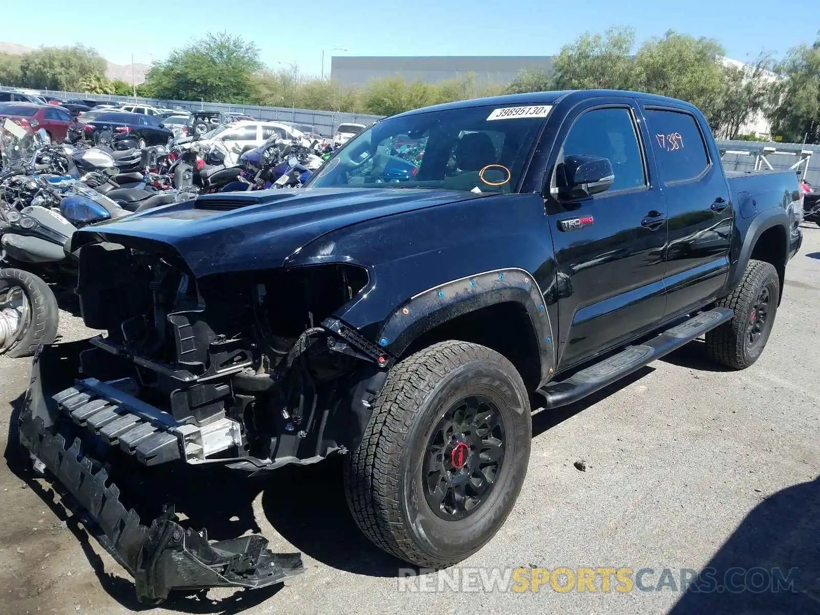 2 Photograph of a damaged car 5TFCZ5AN1KX192369 TOYOTA TACOMA 2019