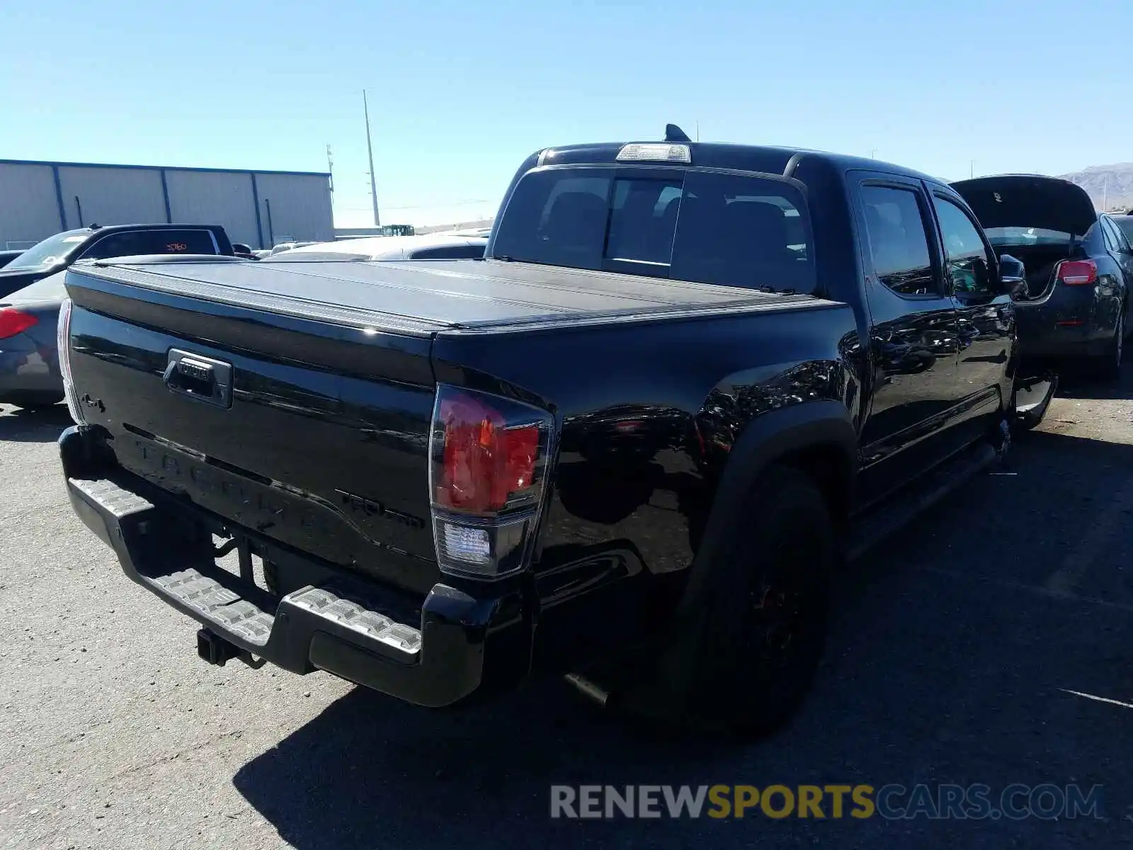 4 Photograph of a damaged car 5TFCZ5AN1KX192369 TOYOTA TACOMA 2019