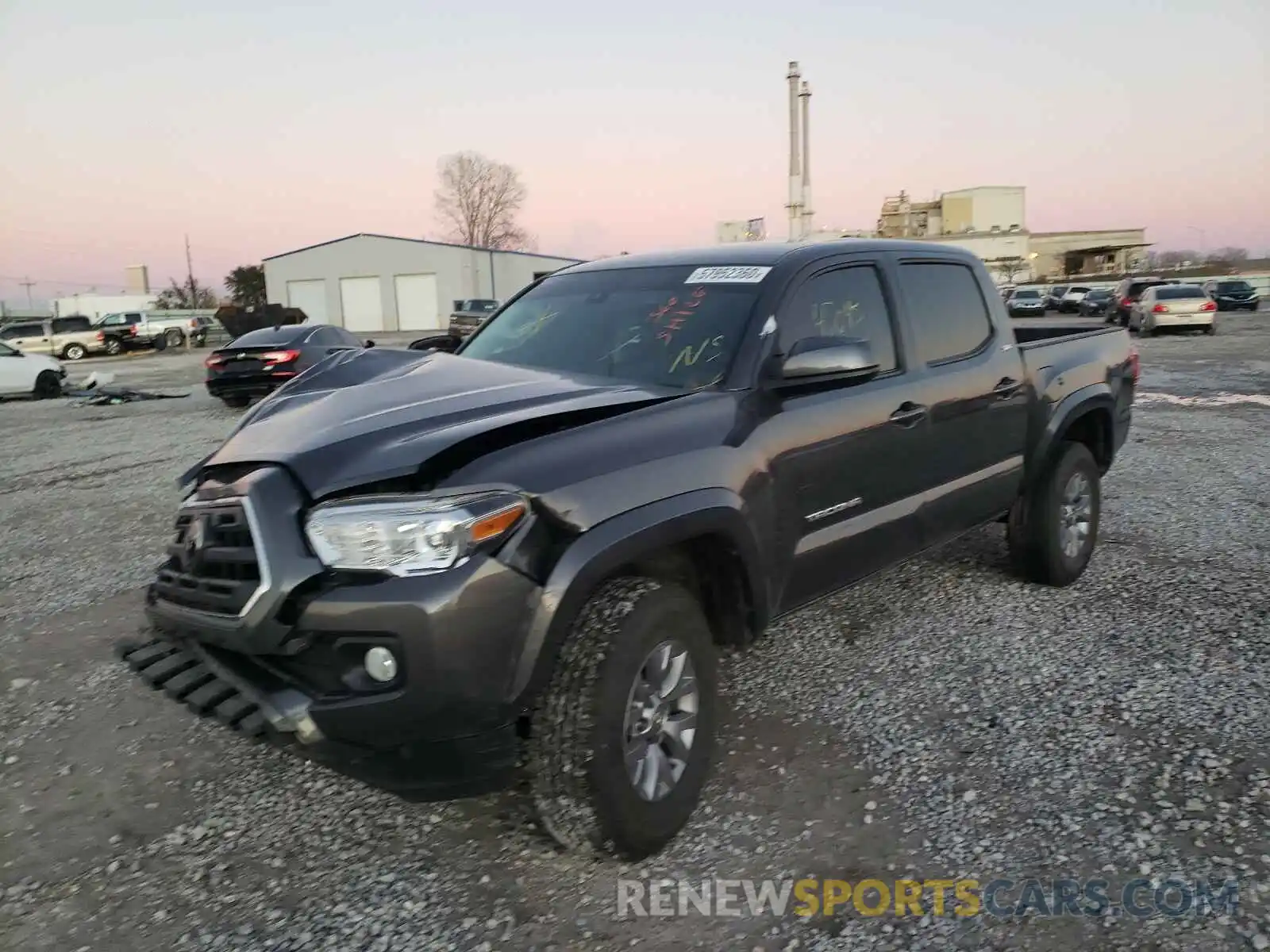 2 Photograph of a damaged car 5TFCZ5AN1KX192940 TOYOTA TACOMA 2019