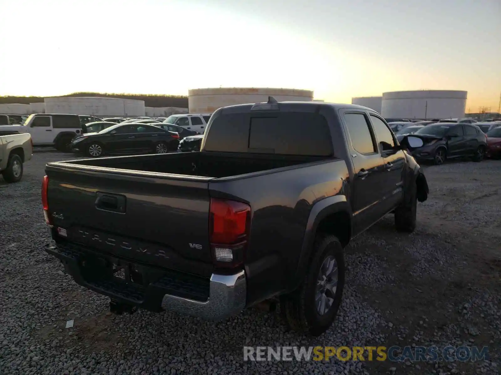 4 Photograph of a damaged car 5TFCZ5AN1KX192940 TOYOTA TACOMA 2019