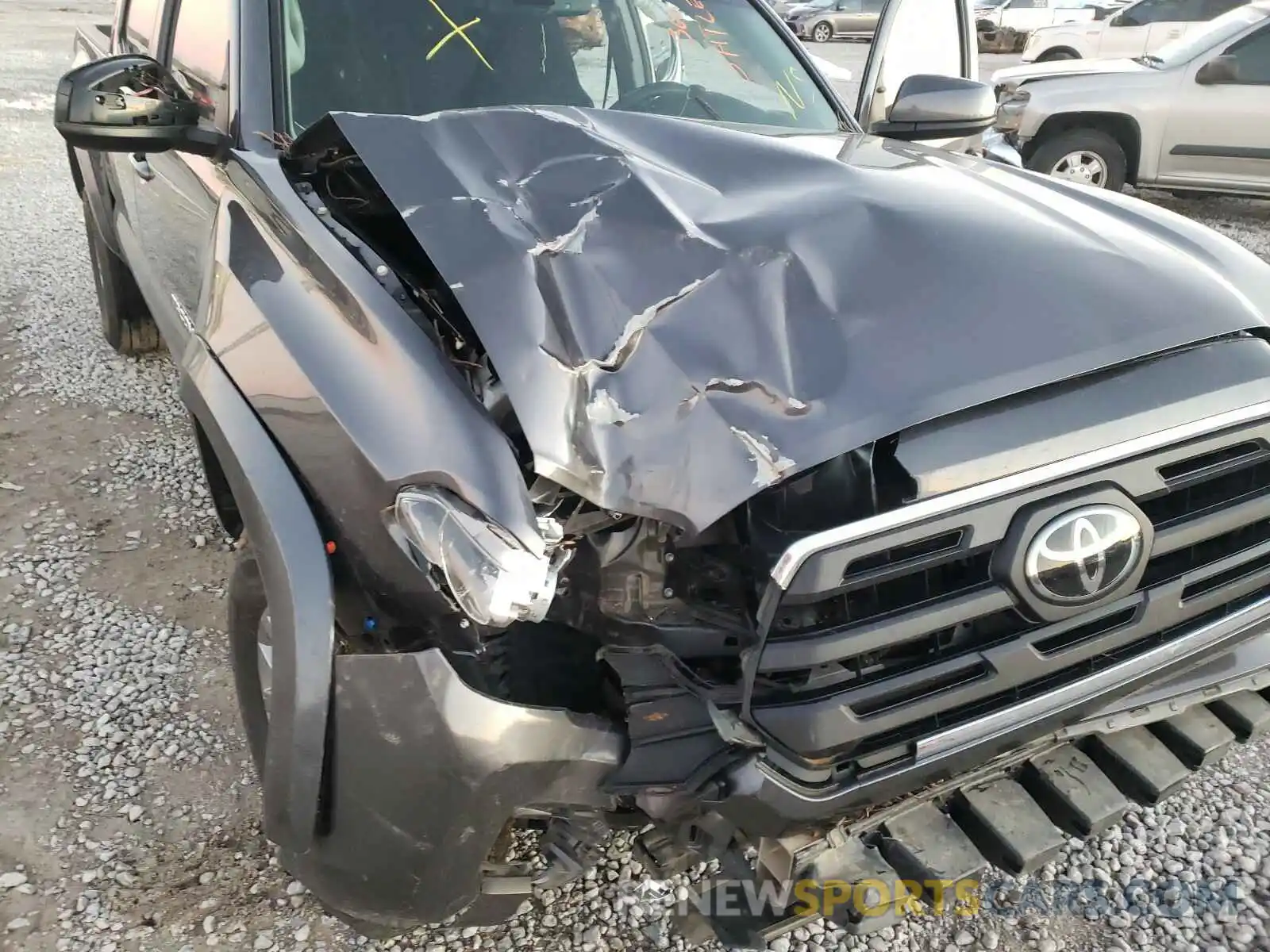 9 Photograph of a damaged car 5TFCZ5AN1KX192940 TOYOTA TACOMA 2019