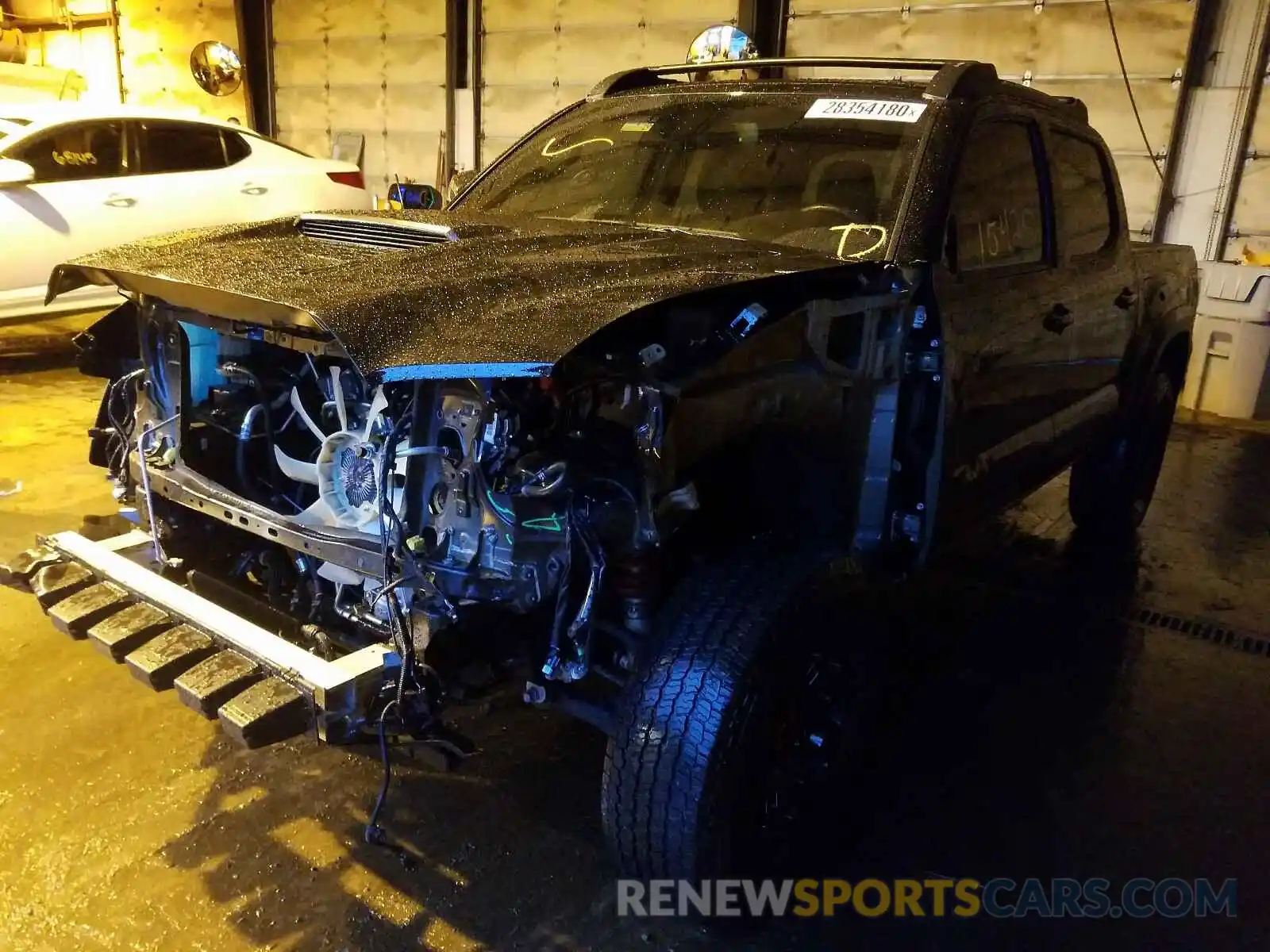 2 Photograph of a damaged car 5TFCZ5AN1KX194462 TOYOTA TACOMA 2019