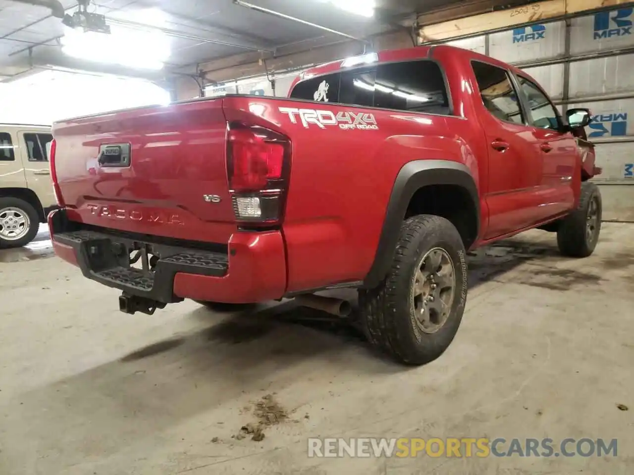 4 Photograph of a damaged car 5TFCZ5AN1KX195398 TOYOTA TACOMA 2019