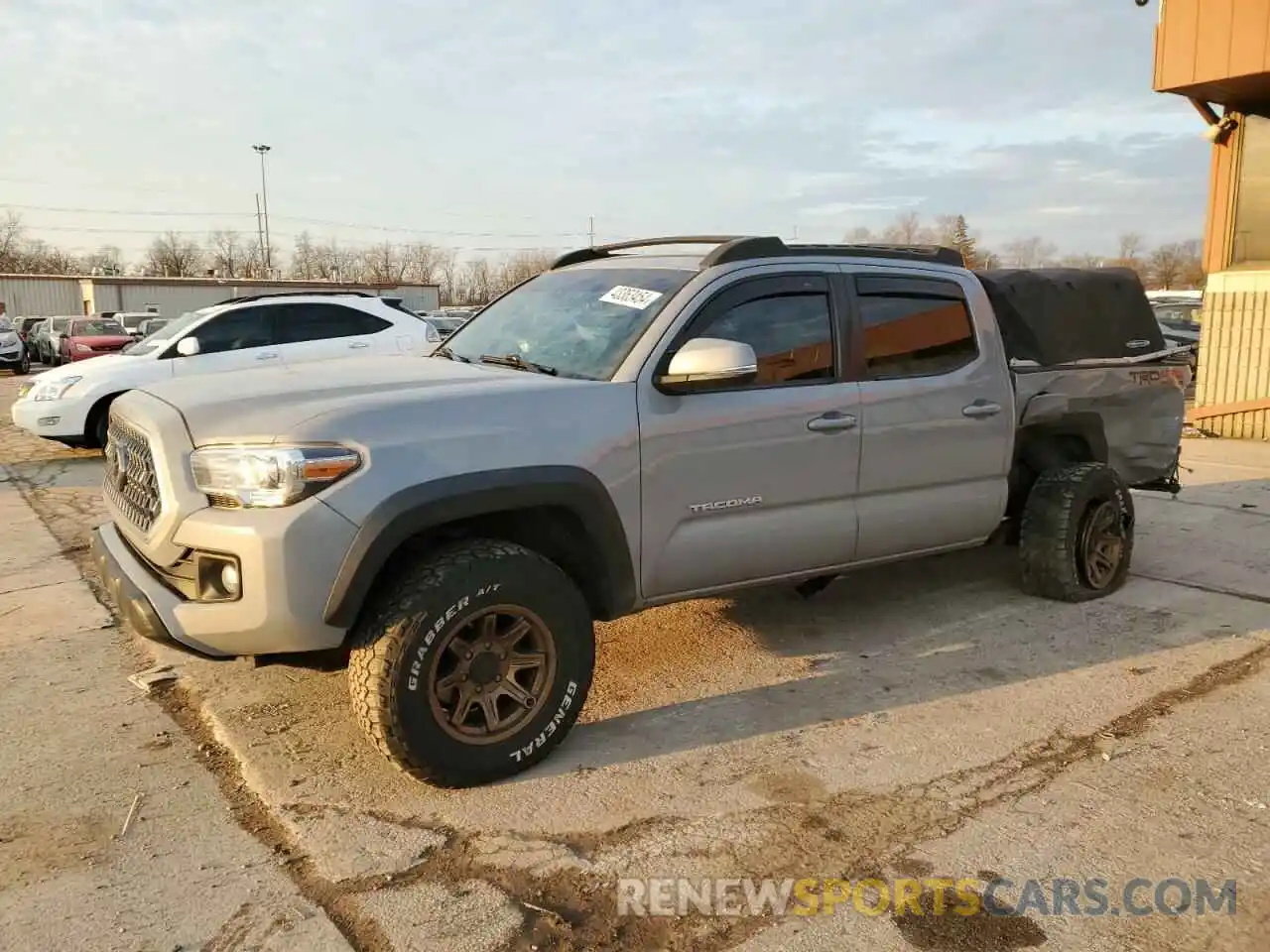 1 Photograph of a damaged car 5TFCZ5AN1KX199984 TOYOTA TACOMA 2019