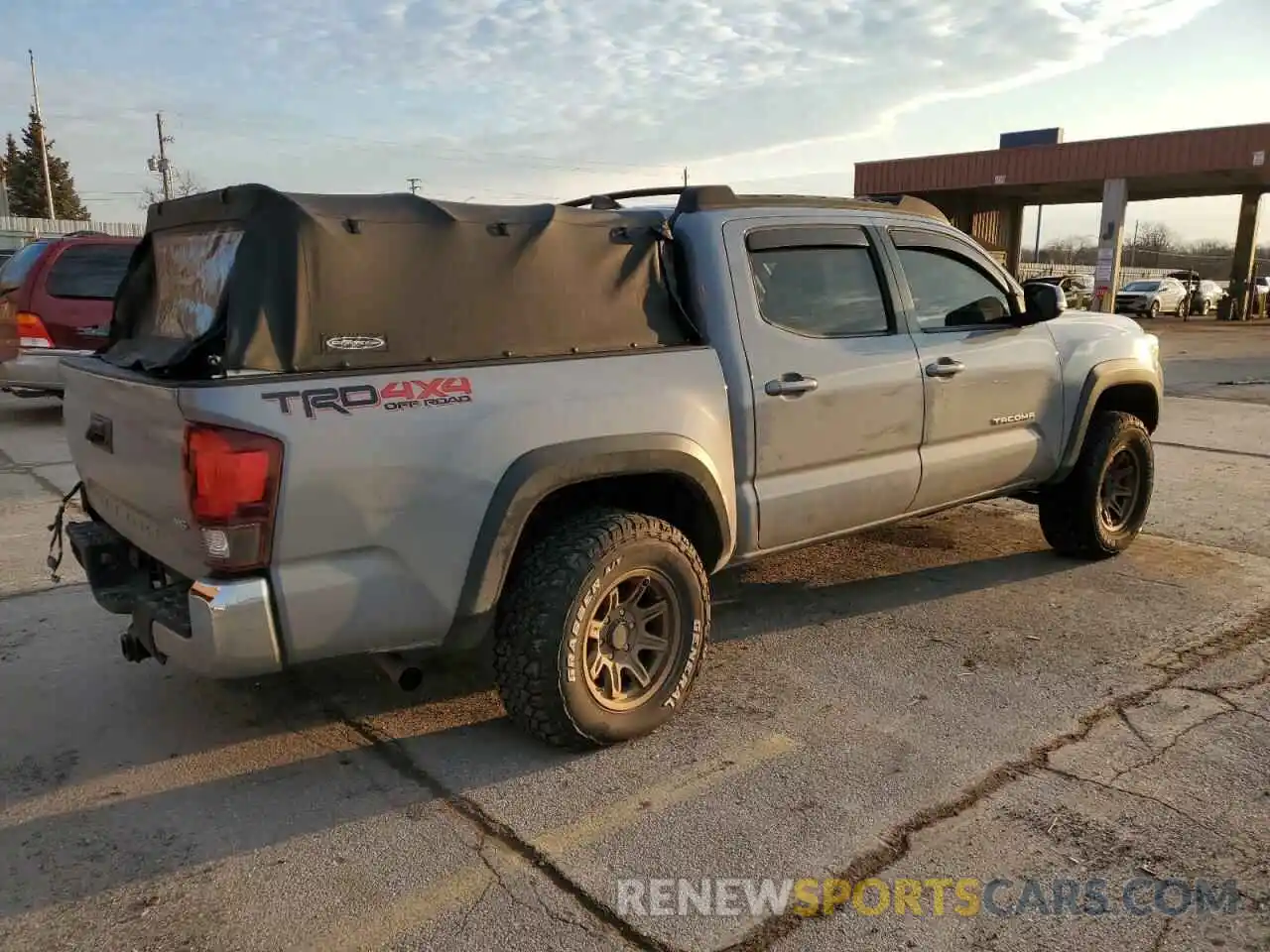 3 Photograph of a damaged car 5TFCZ5AN1KX199984 TOYOTA TACOMA 2019