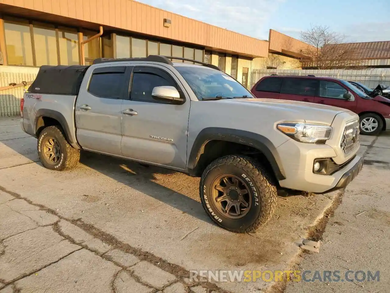 4 Photograph of a damaged car 5TFCZ5AN1KX199984 TOYOTA TACOMA 2019