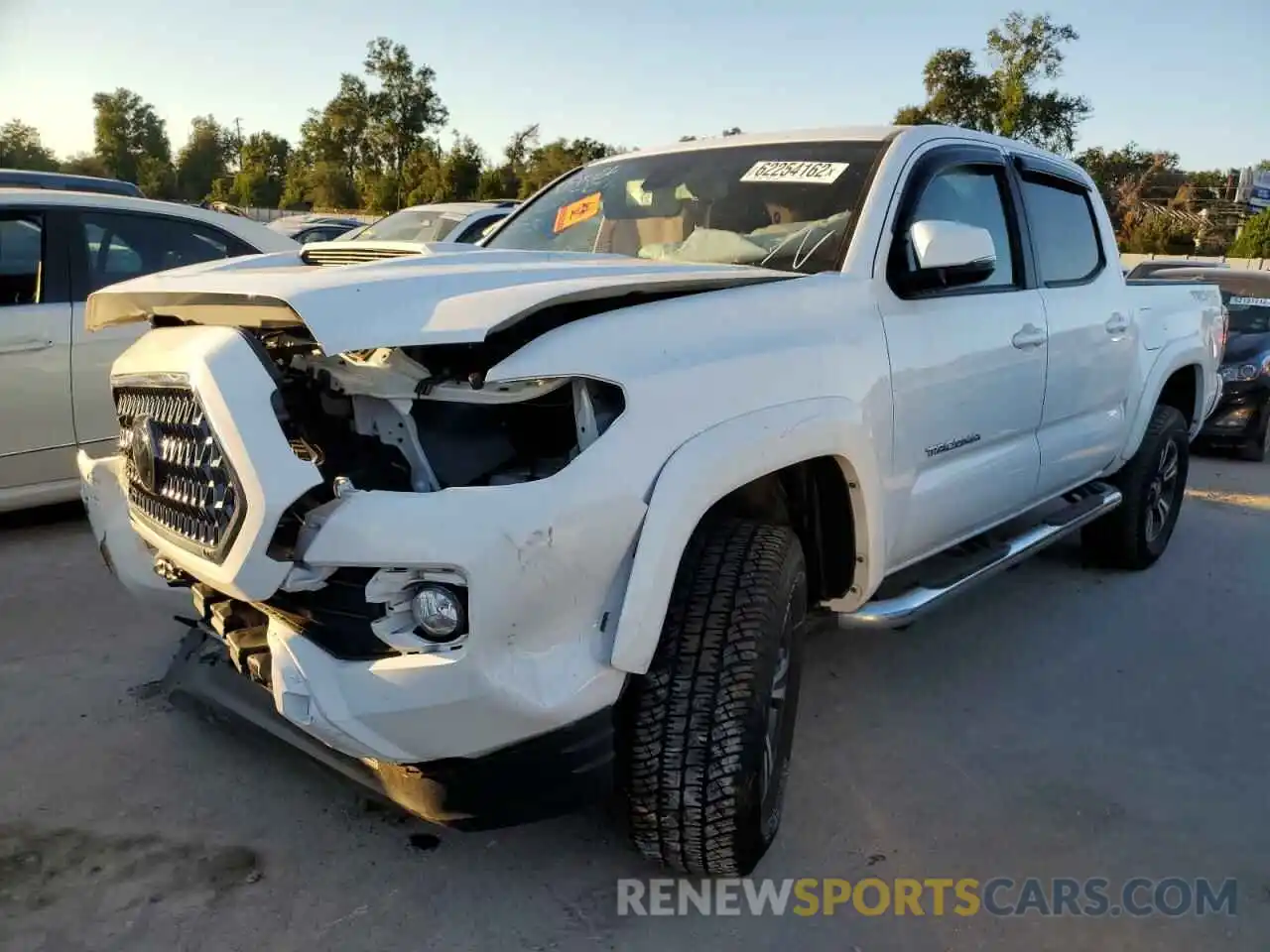 2 Photograph of a damaged car 5TFCZ5AN1KX201815 TOYOTA TACOMA 2019