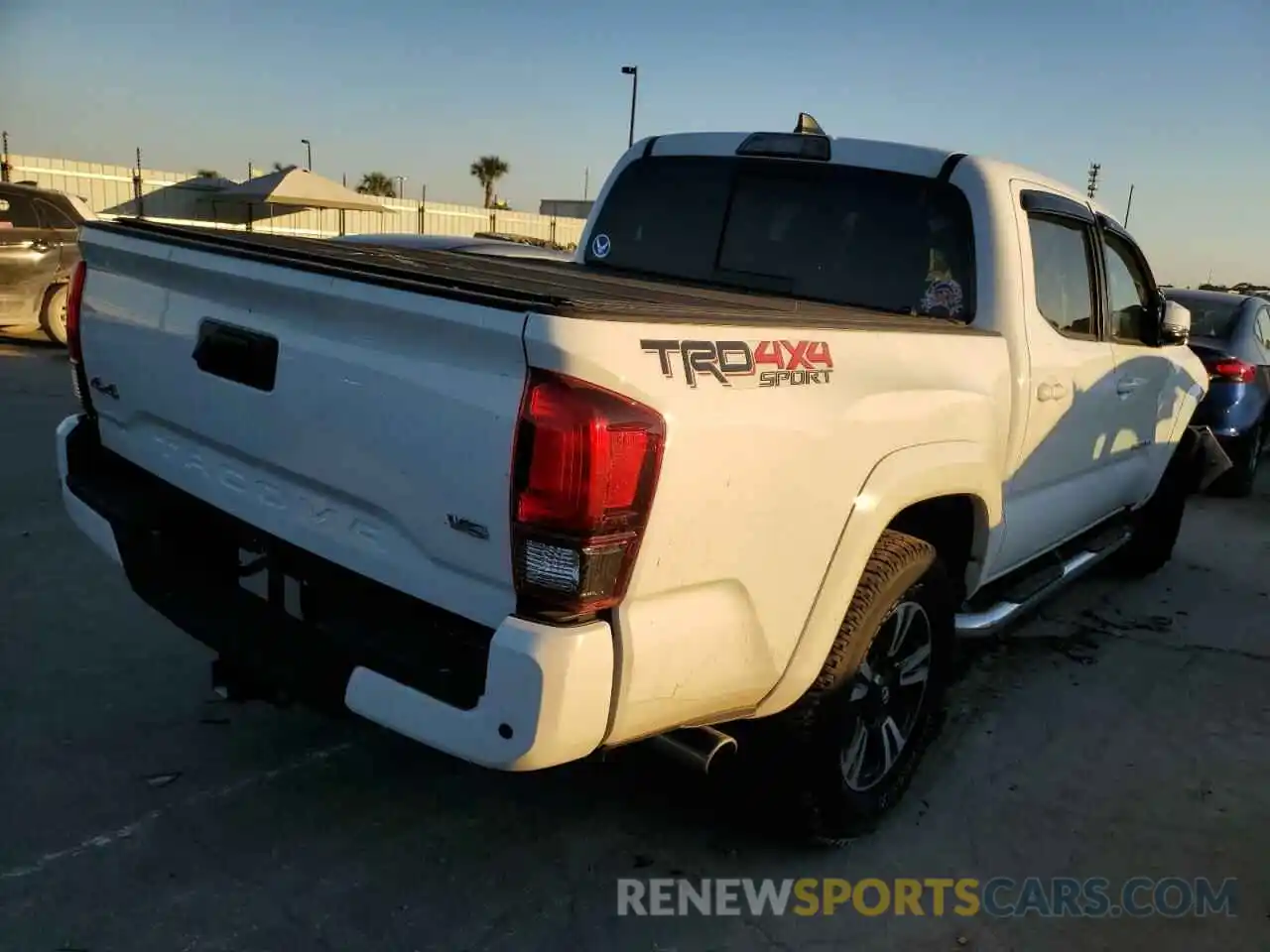 4 Photograph of a damaged car 5TFCZ5AN1KX201815 TOYOTA TACOMA 2019