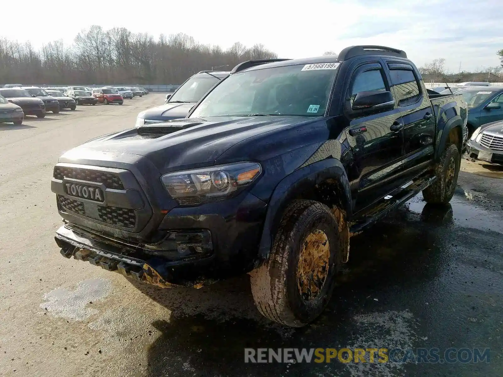 2 Photograph of a damaged car 5TFCZ5AN1KX202141 TOYOTA TACOMA 2019