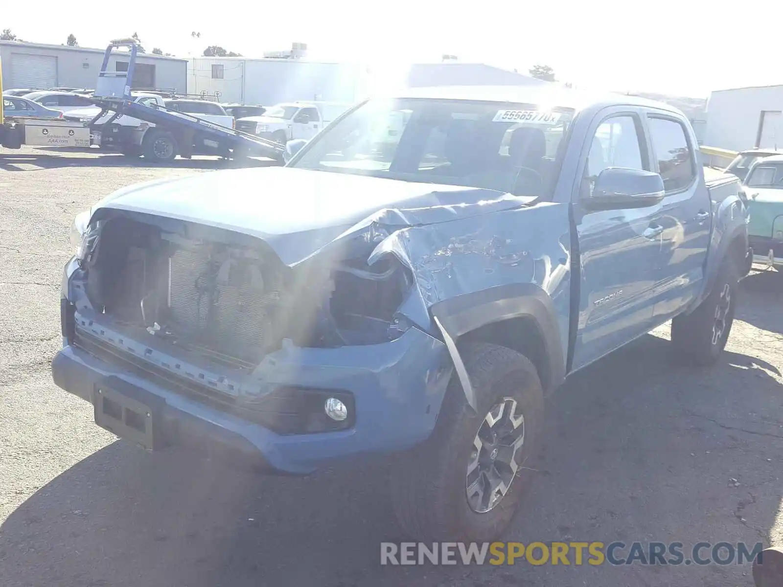 2 Photograph of a damaged car 5TFCZ5AN1KX206853 TOYOTA TACOMA 2019