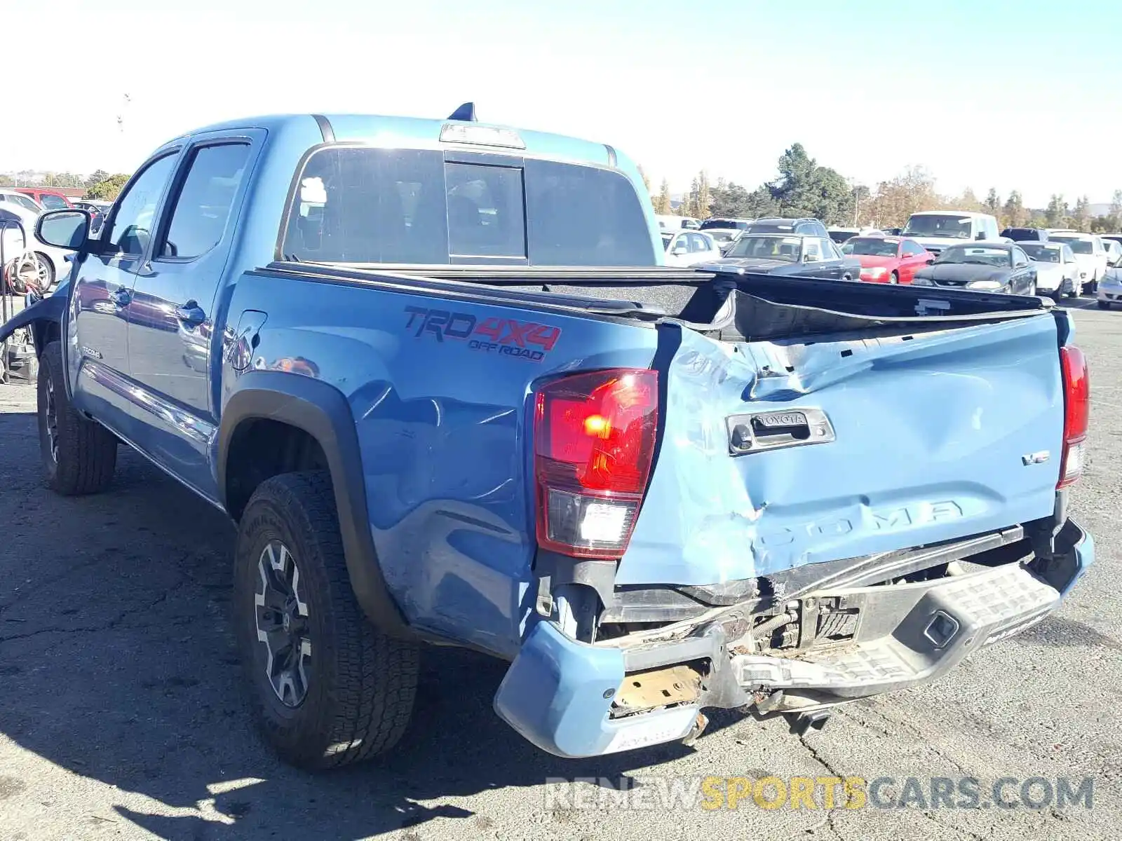 3 Photograph of a damaged car 5TFCZ5AN1KX206853 TOYOTA TACOMA 2019