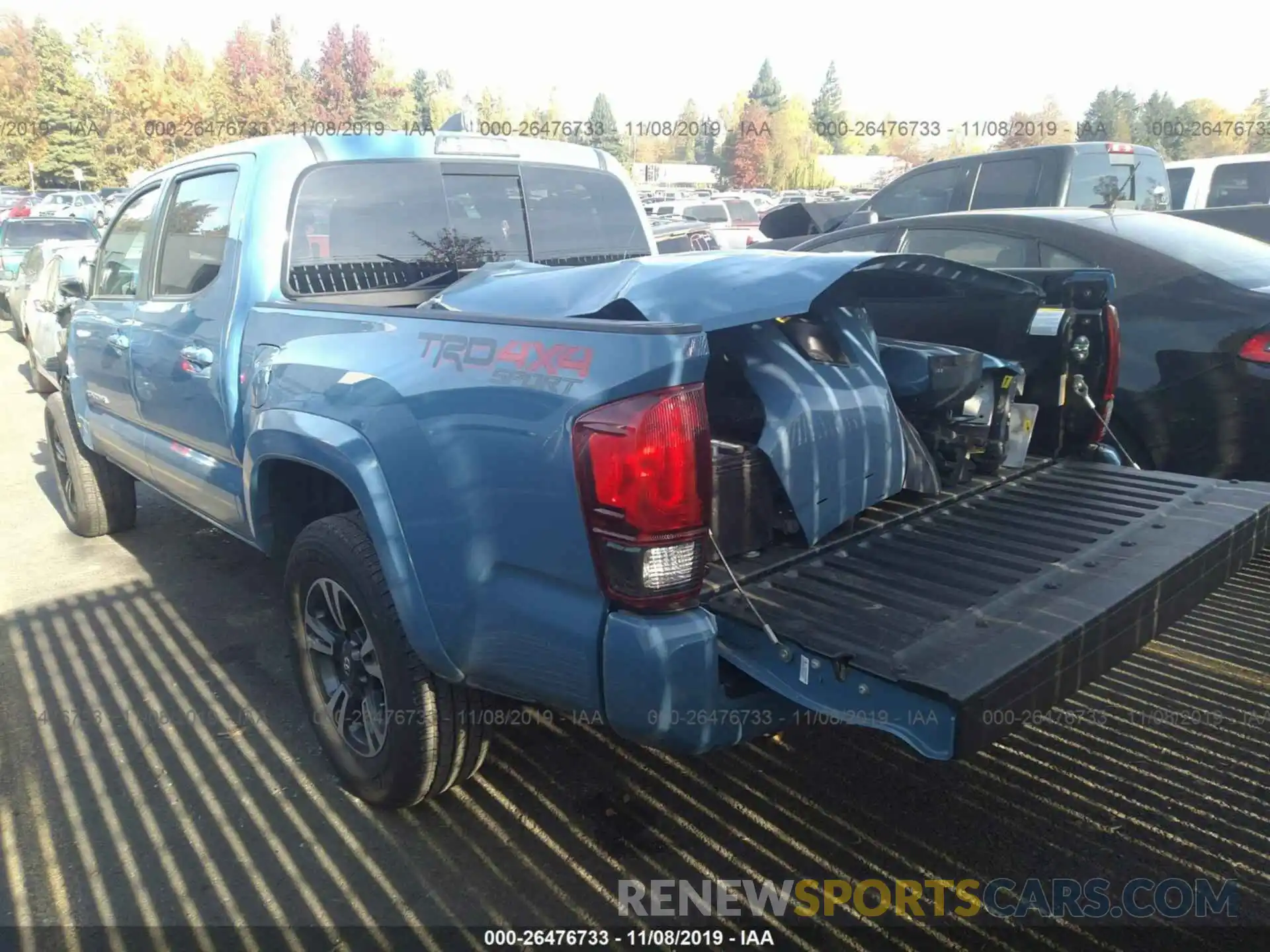 3 Photograph of a damaged car 5TFCZ5AN2KX168887 TOYOTA TACOMA 2019