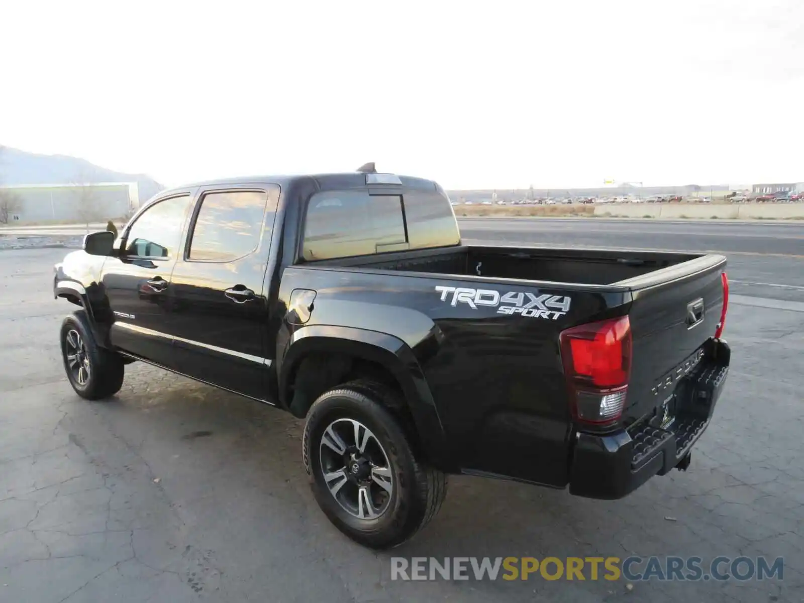 3 Photograph of a damaged car 5TFCZ5AN2KX171644 TOYOTA TACOMA 2019