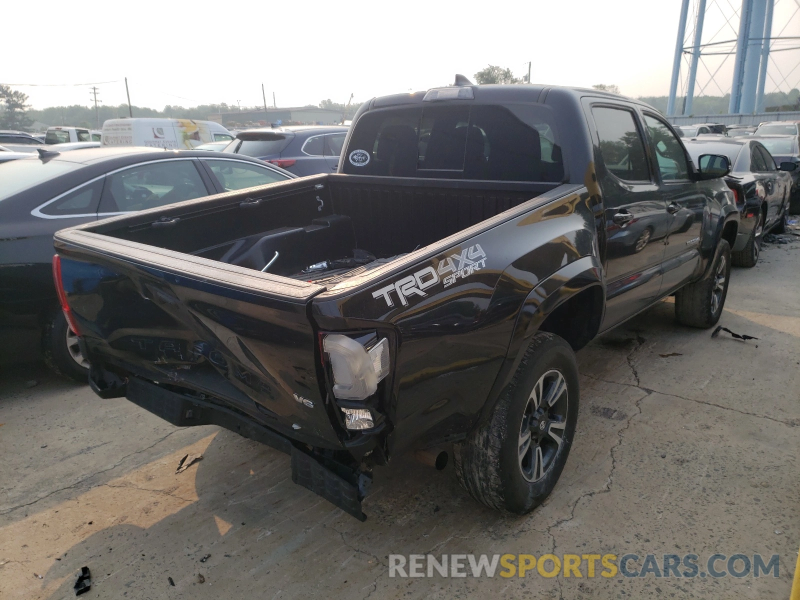 4 Photograph of a damaged car 5TFCZ5AN2KX173460 TOYOTA TACOMA 2019