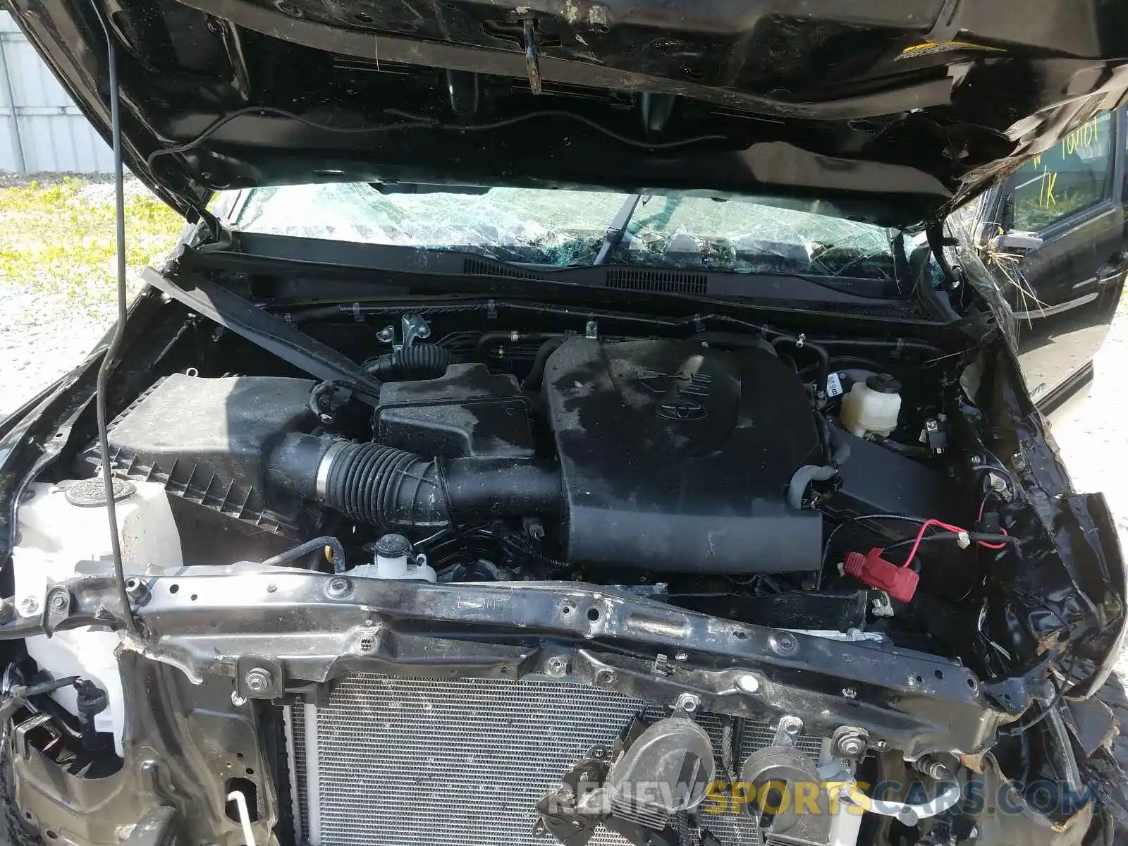 7 Photograph of a damaged car 5TFCZ5AN2KX174009 TOYOTA TACOMA 2019