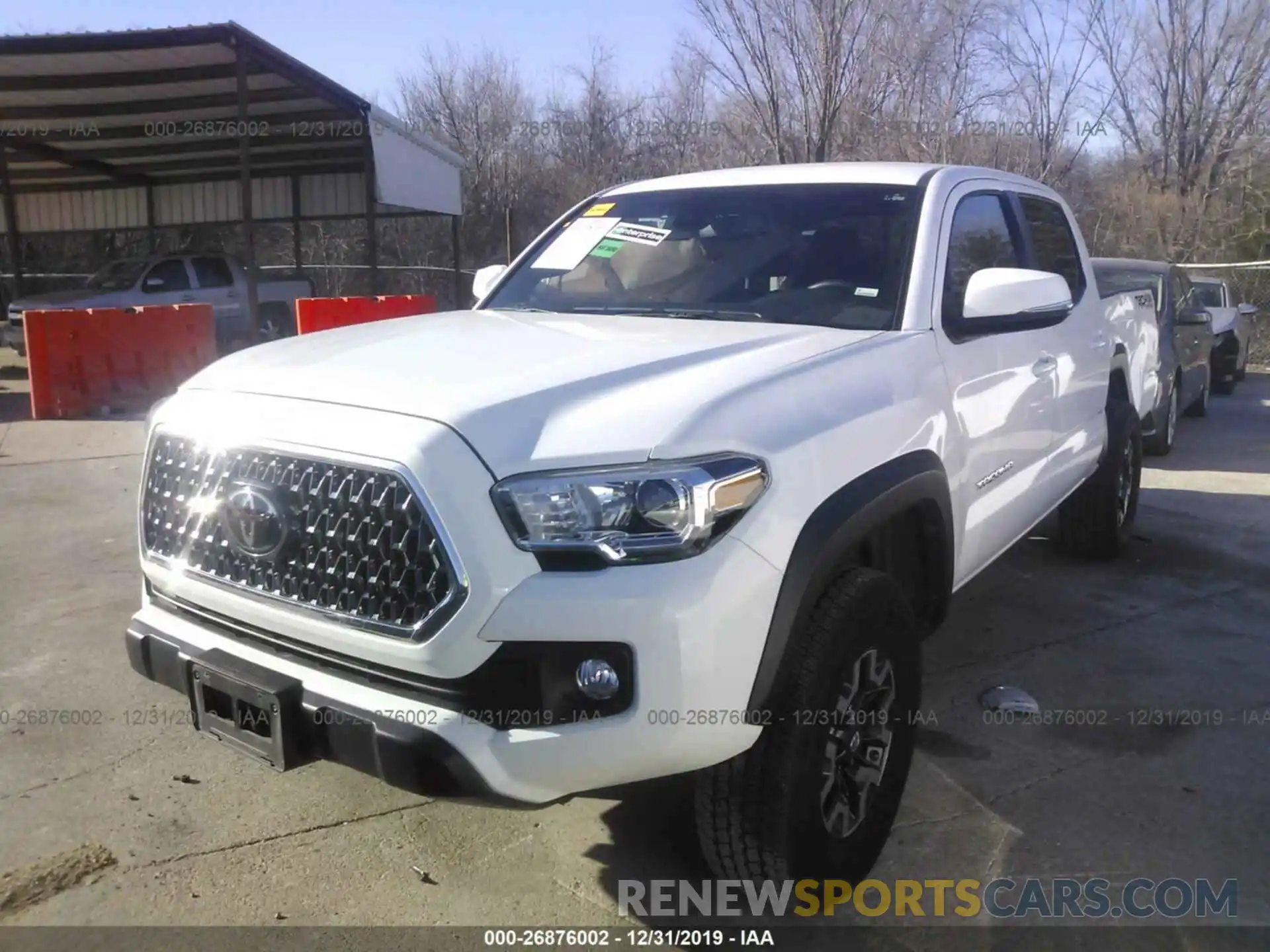 2 Photograph of a damaged car 5TFCZ5AN2KX177489 TOYOTA TACOMA 2019