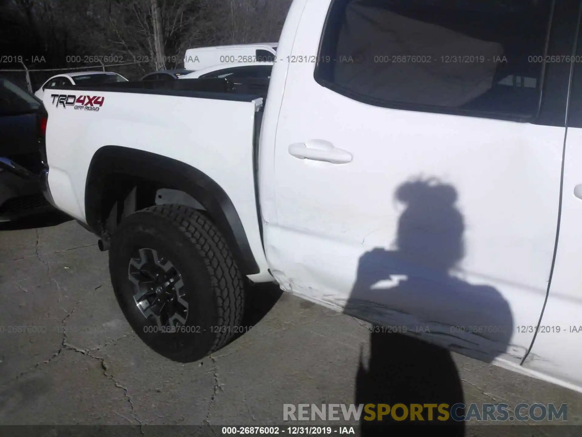 6 Photograph of a damaged car 5TFCZ5AN2KX177489 TOYOTA TACOMA 2019