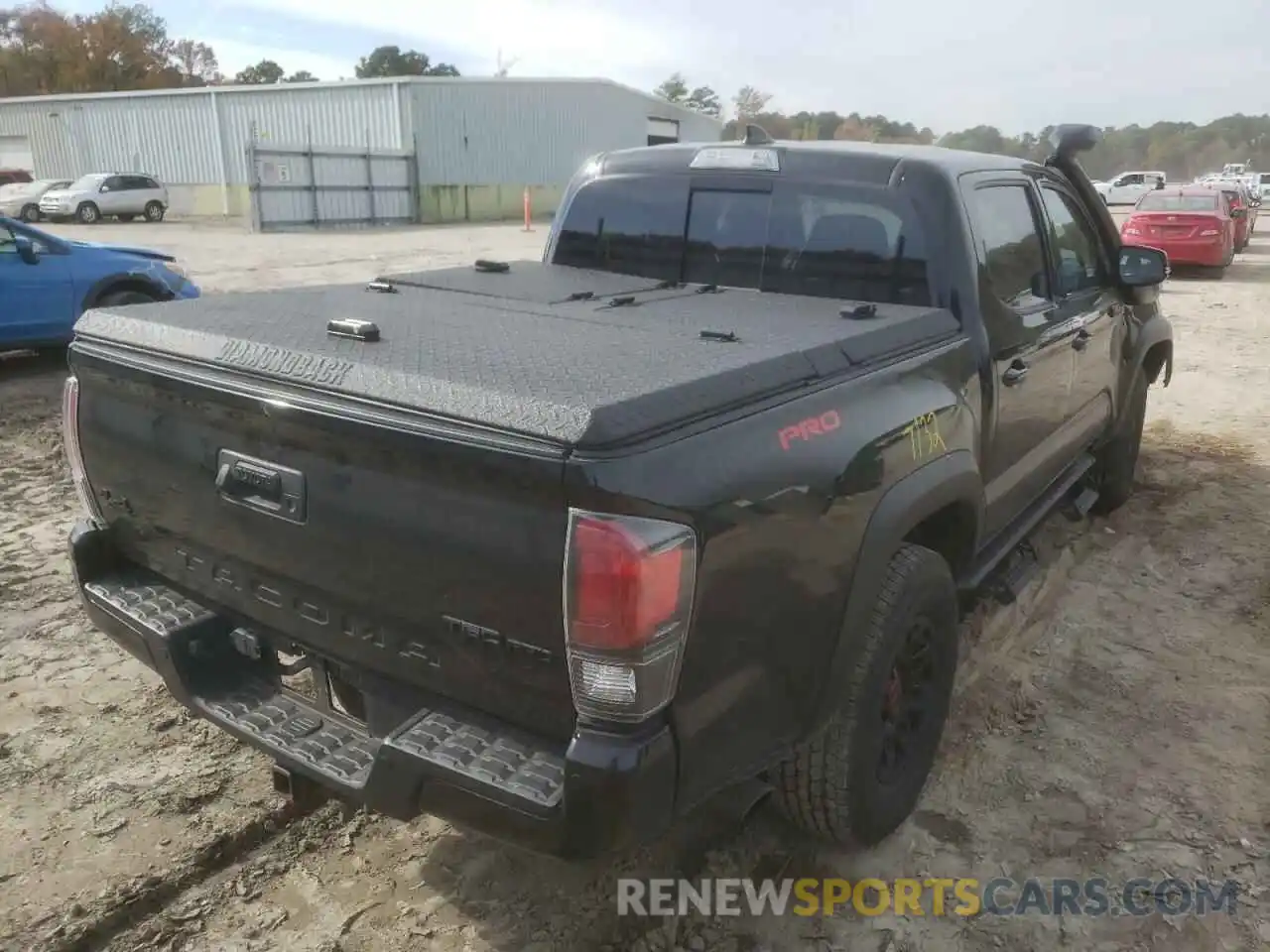 4 Photograph of a damaged car 5TFCZ5AN2KX177590 TOYOTA TACOMA 2019