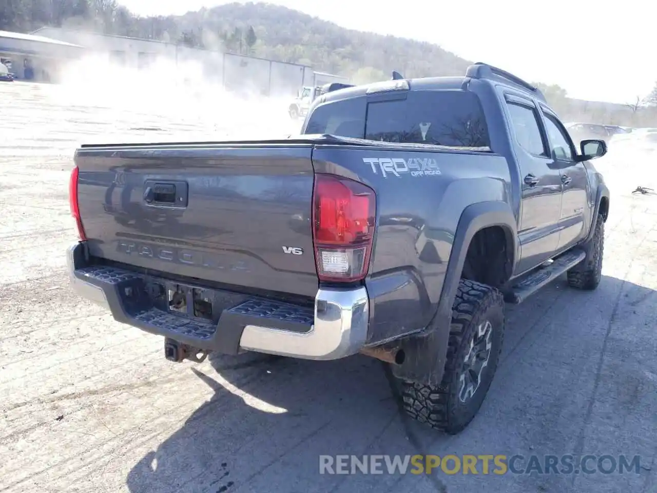 4 Photograph of a damaged car 5TFCZ5AN2KX178139 TOYOTA TACOMA 2019