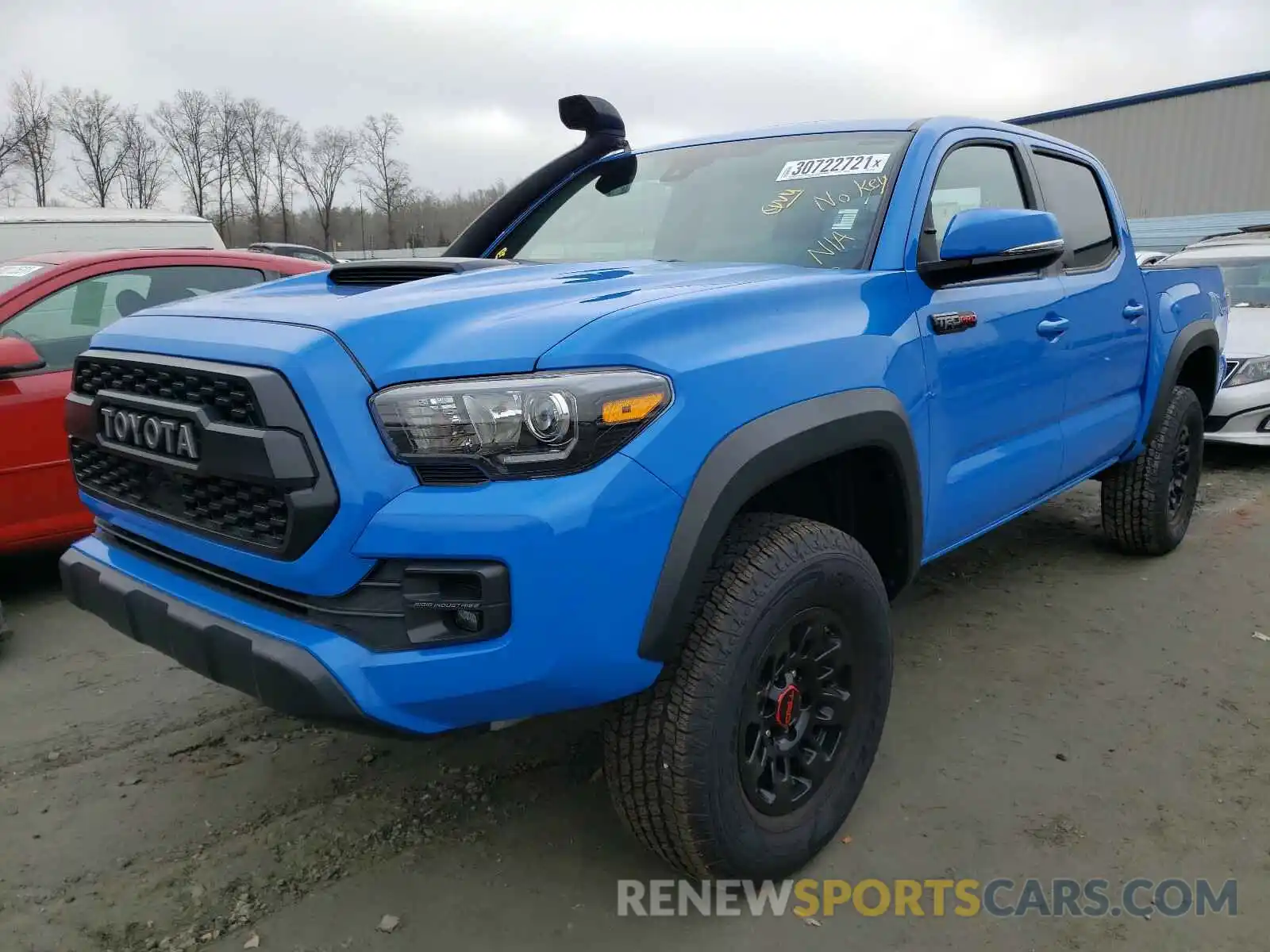 2 Photograph of a damaged car 5TFCZ5AN2KX179646 TOYOTA TACOMA 2019