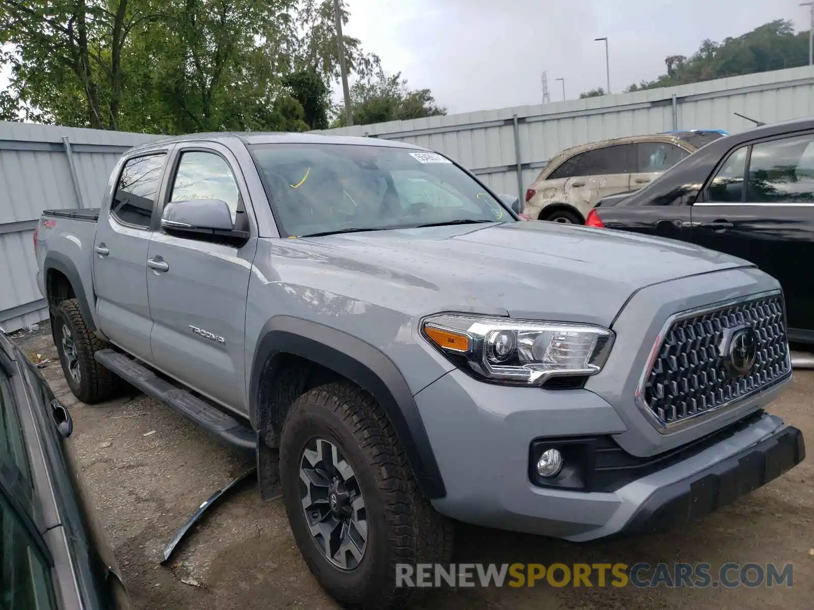 1 Photograph of a damaged car 5TFCZ5AN2KX180974 TOYOTA TACOMA 2019