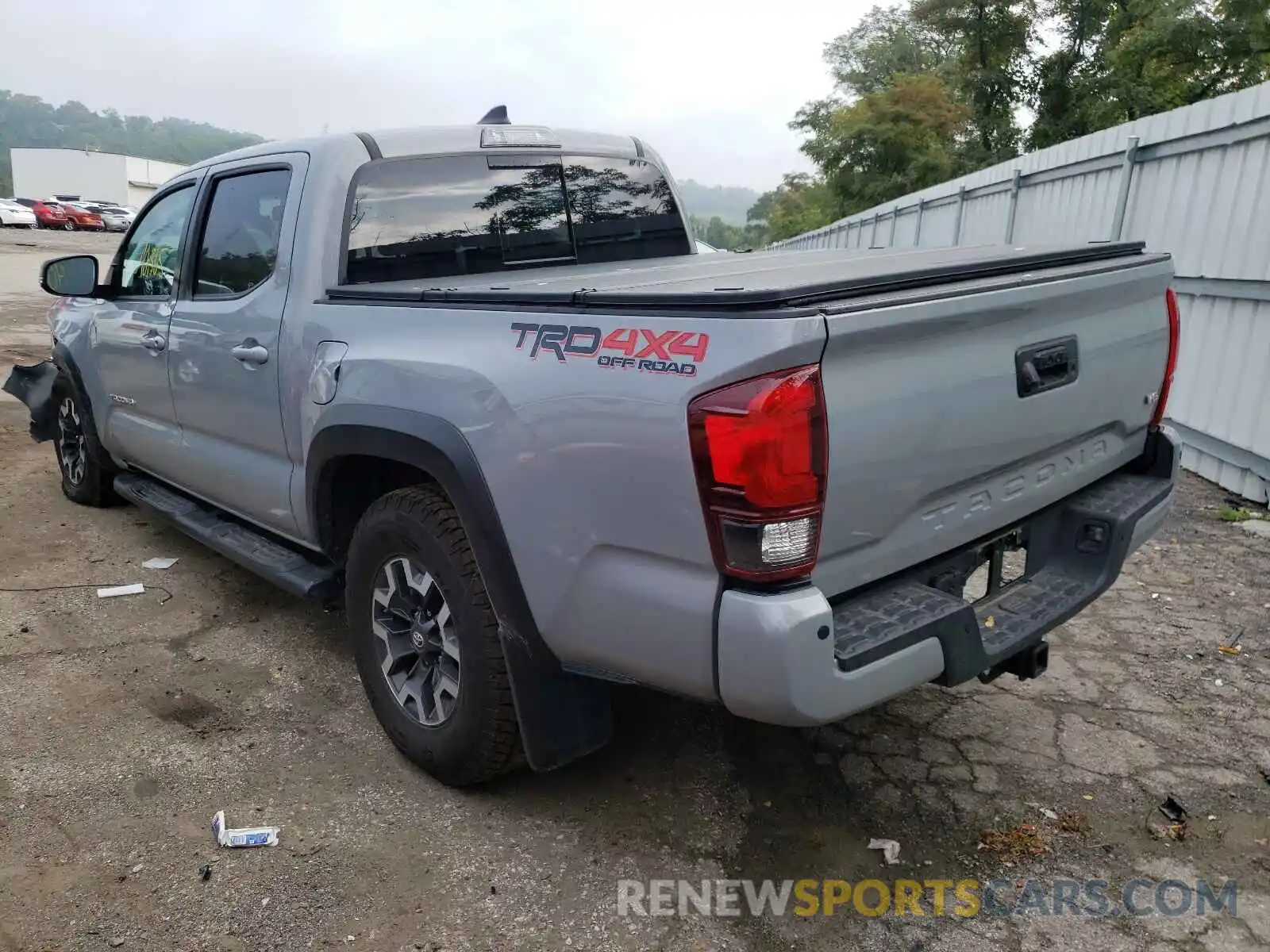 3 Photograph of a damaged car 5TFCZ5AN2KX180974 TOYOTA TACOMA 2019