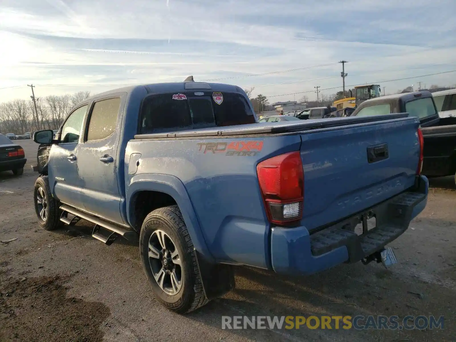 3 Photograph of a damaged car 5TFCZ5AN2KX182031 TOYOTA TACOMA 2019