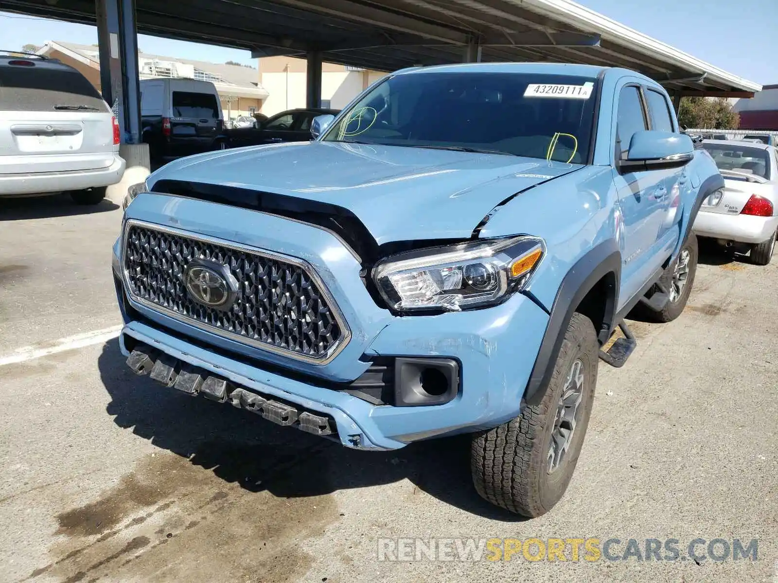 2 Photograph of a damaged car 5TFCZ5AN2KX183776 TOYOTA TACOMA 2019