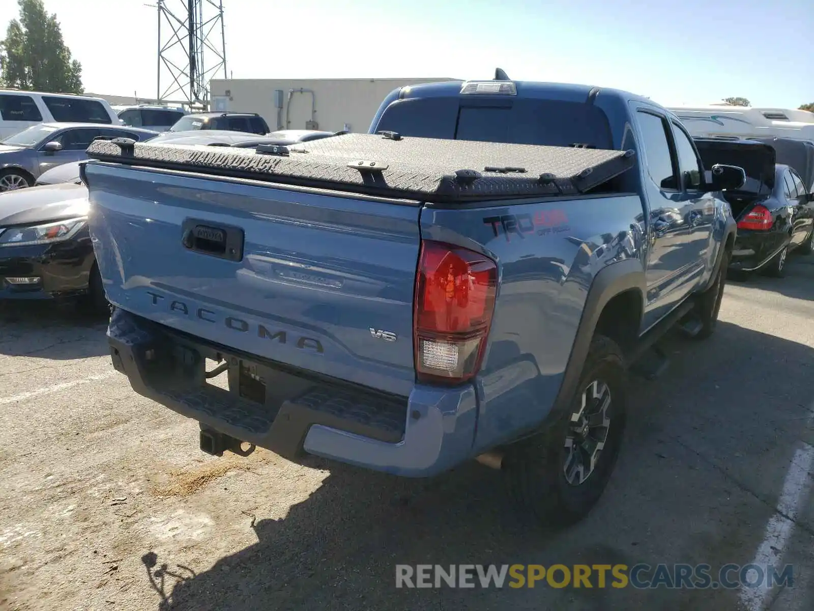 4 Photograph of a damaged car 5TFCZ5AN2KX183776 TOYOTA TACOMA 2019