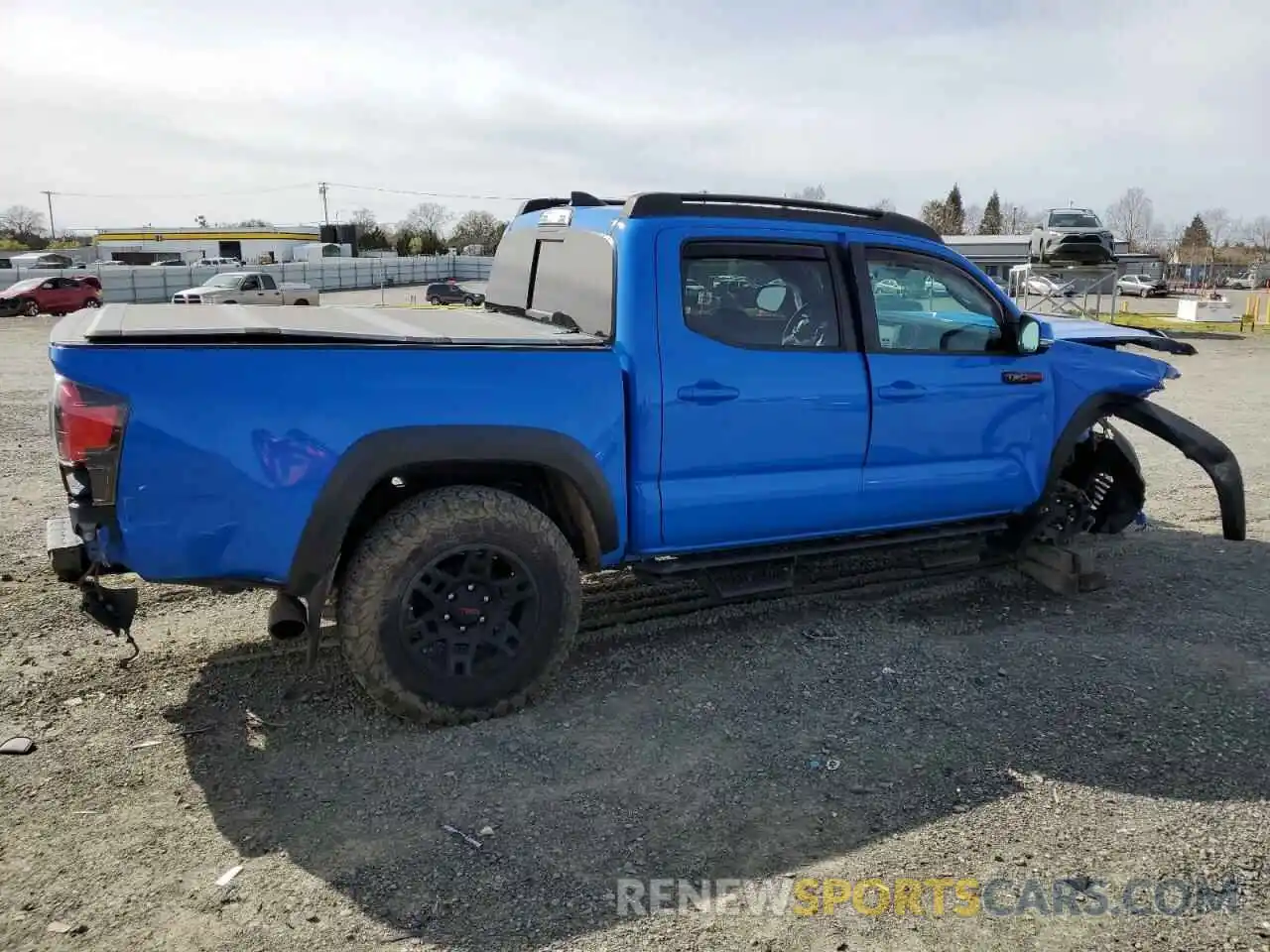 3 Photograph of a damaged car 5TFCZ5AN2KX185897 TOYOTA TACOMA 2019