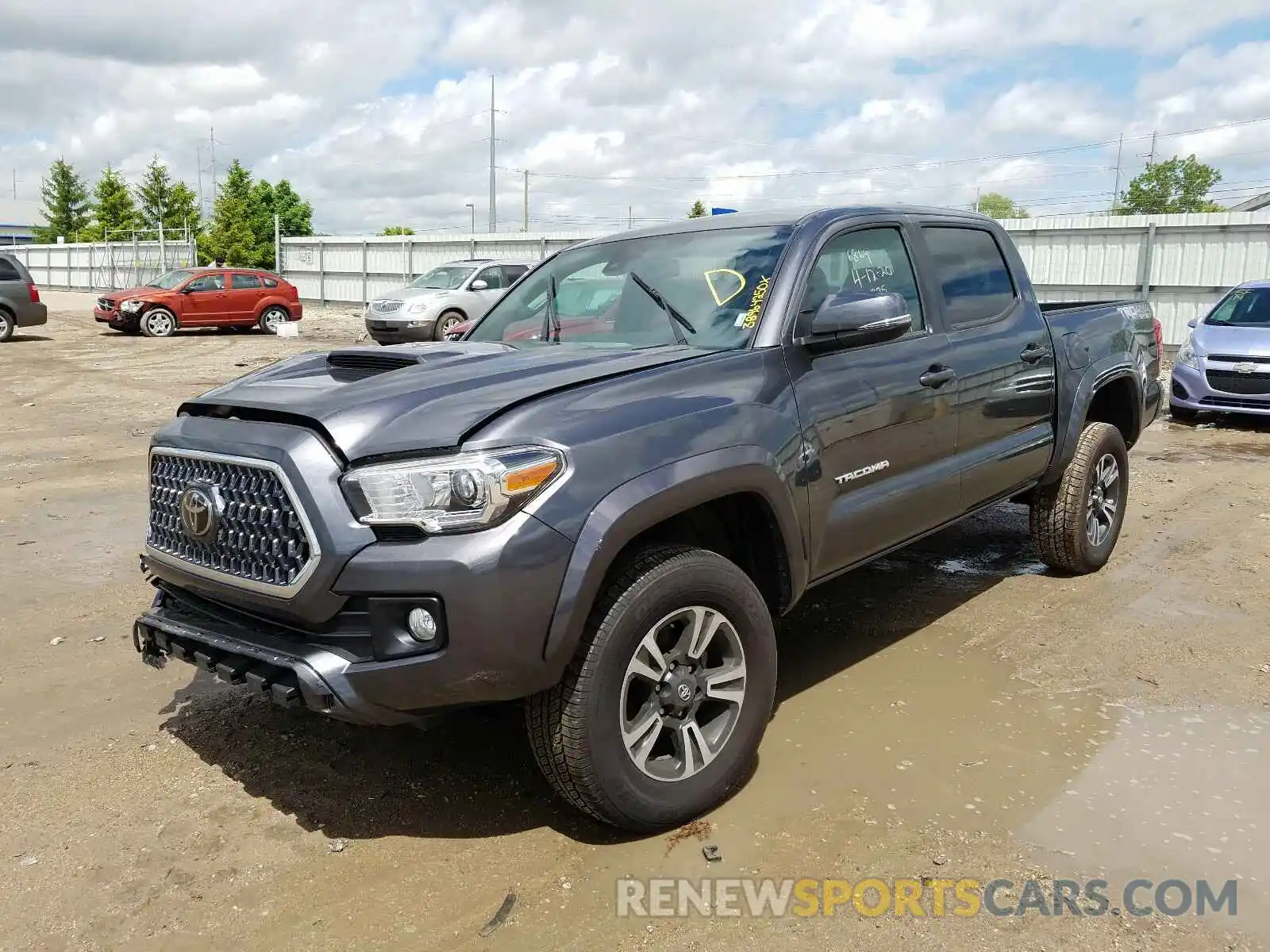 2 Photograph of a damaged car 5TFCZ5AN2KX186869 TOYOTA TACOMA 2019