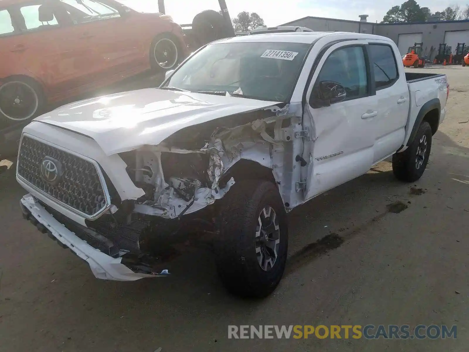 2 Photograph of a damaged car 5TFCZ5AN2KX190517 TOYOTA TACOMA 2019