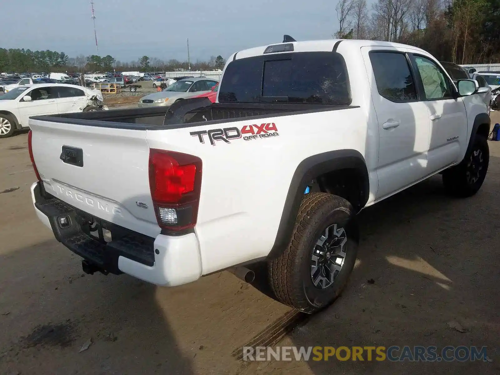 4 Photograph of a damaged car 5TFCZ5AN2KX190517 TOYOTA TACOMA 2019