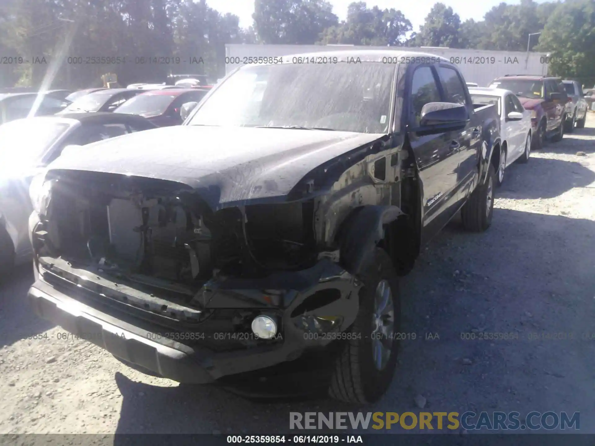 2 Photograph of a damaged car 5TFCZ5AN2KX190677 TOYOTA TACOMA 2019