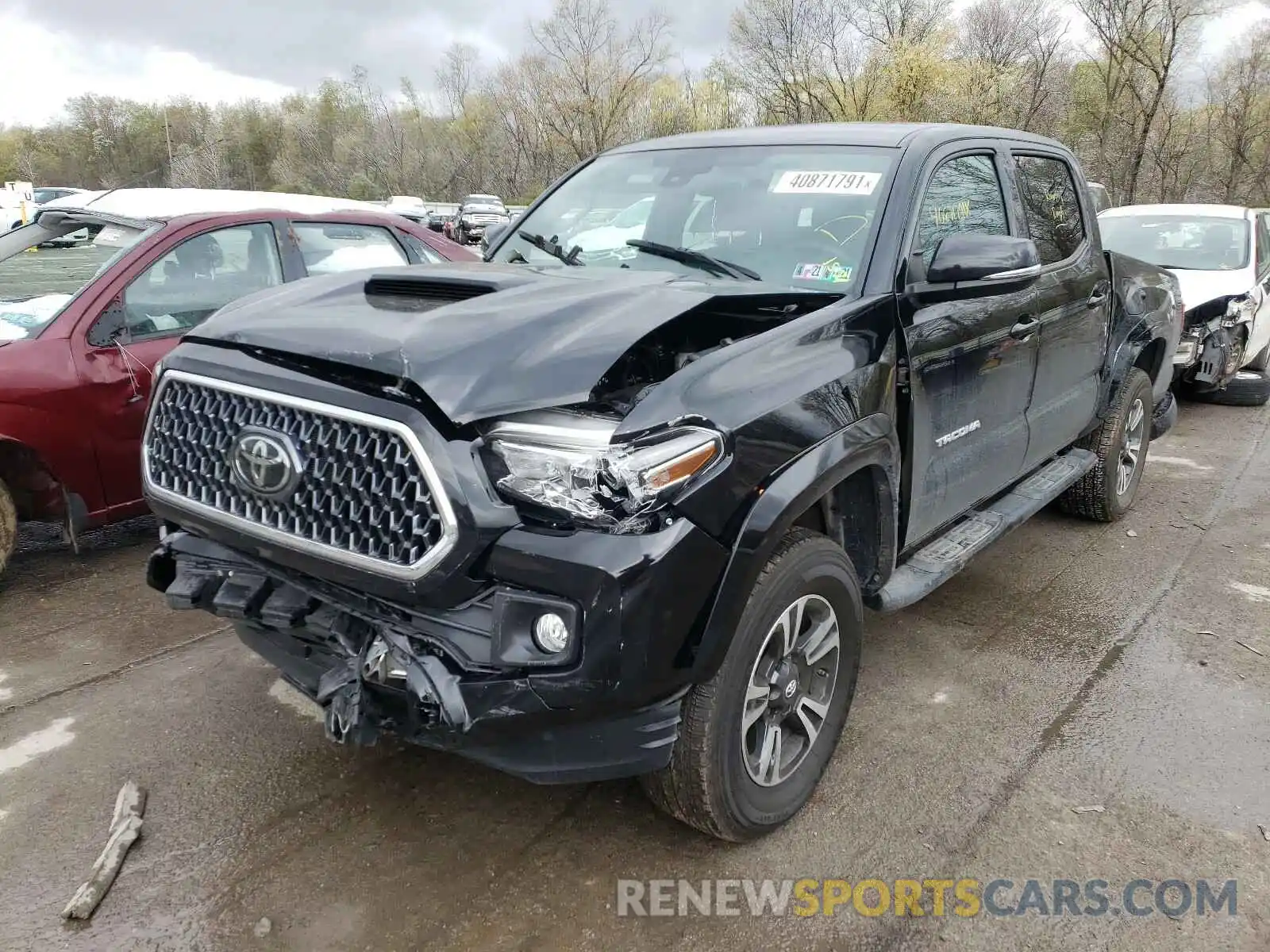 2 Photograph of a damaged car 5TFCZ5AN2KX191120 TOYOTA TACOMA 2019