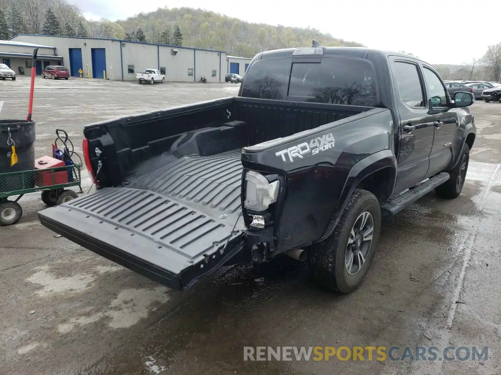 4 Photograph of a damaged car 5TFCZ5AN2KX191120 TOYOTA TACOMA 2019