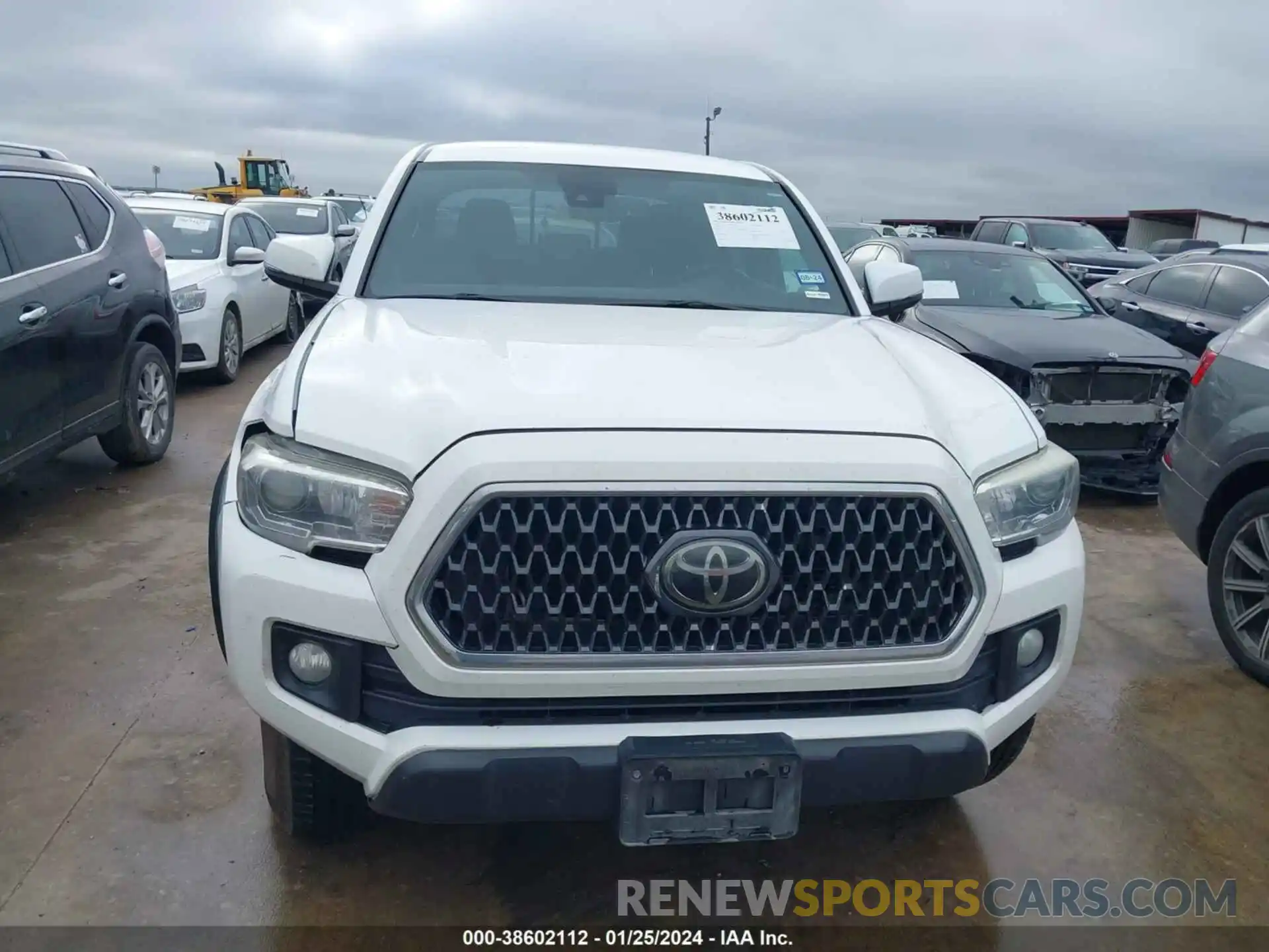 12 Photograph of a damaged car 5TFCZ5AN2KX193109 TOYOTA TACOMA 2019