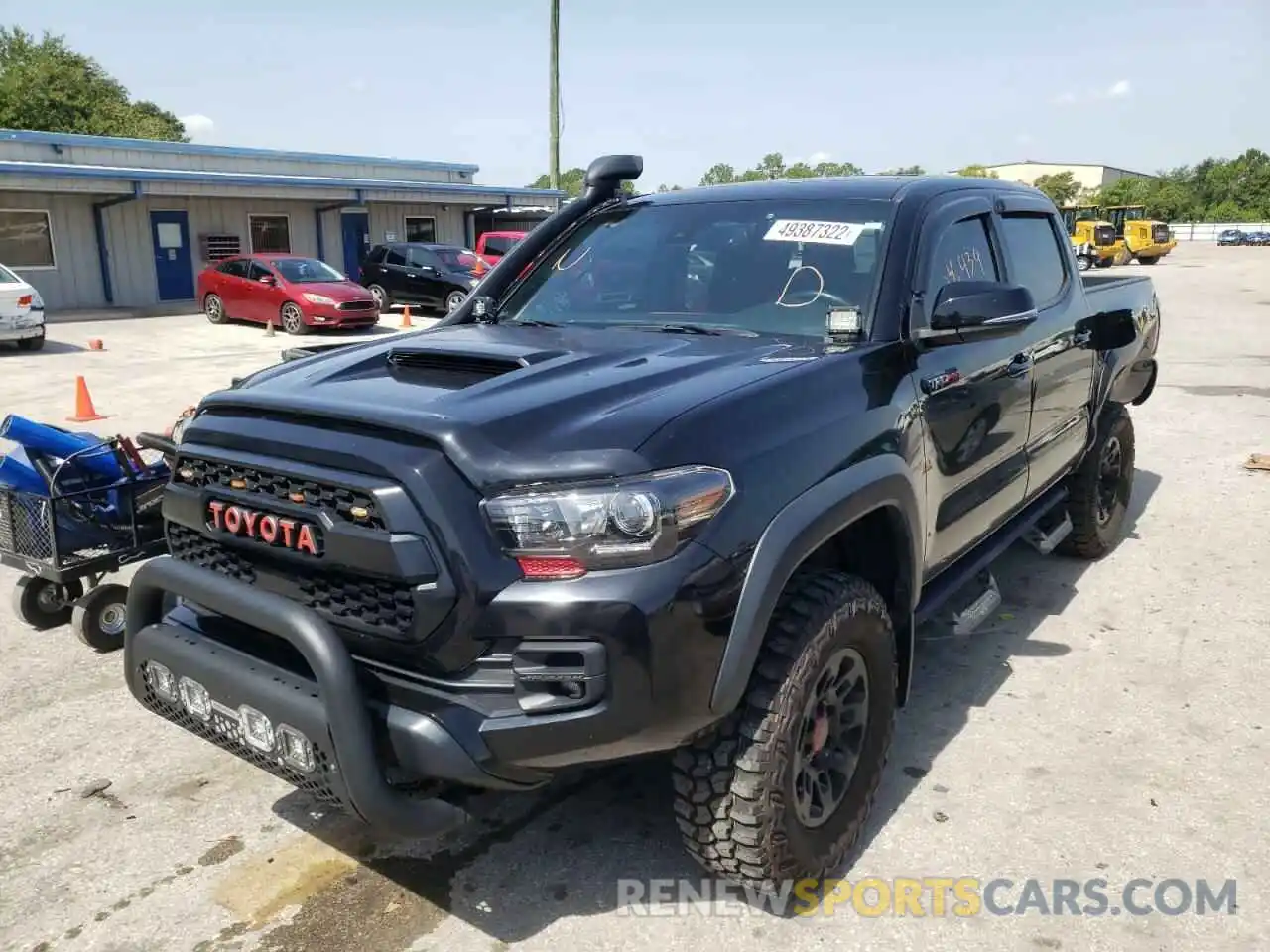 2 Photograph of a damaged car 5TFCZ5AN2KX193336 TOYOTA TACOMA 2019