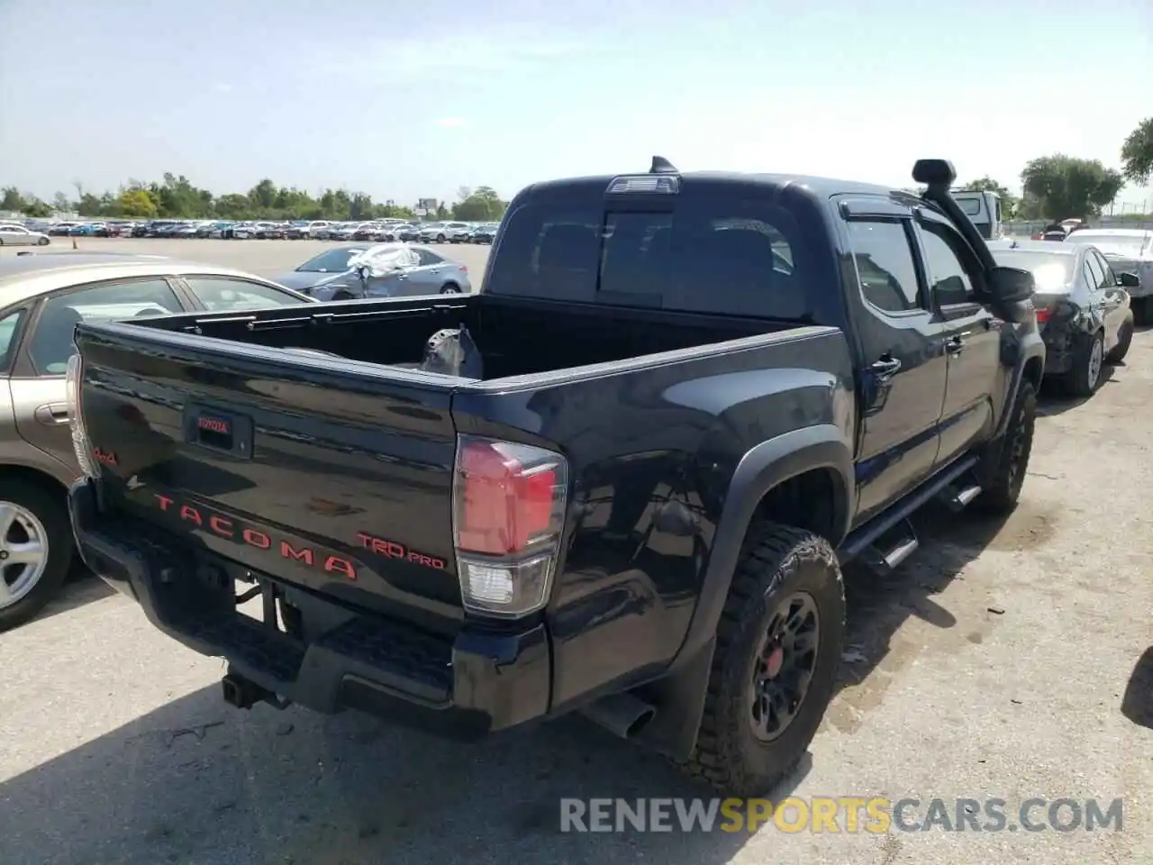 4 Photograph of a damaged car 5TFCZ5AN2KX193336 TOYOTA TACOMA 2019