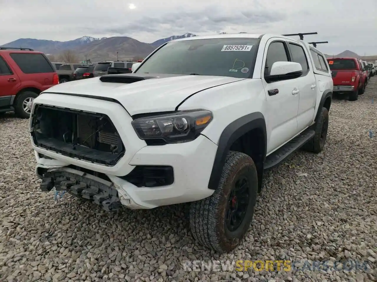 2 Photograph of a damaged car 5TFCZ5AN2KX196446 TOYOTA TACOMA 2019