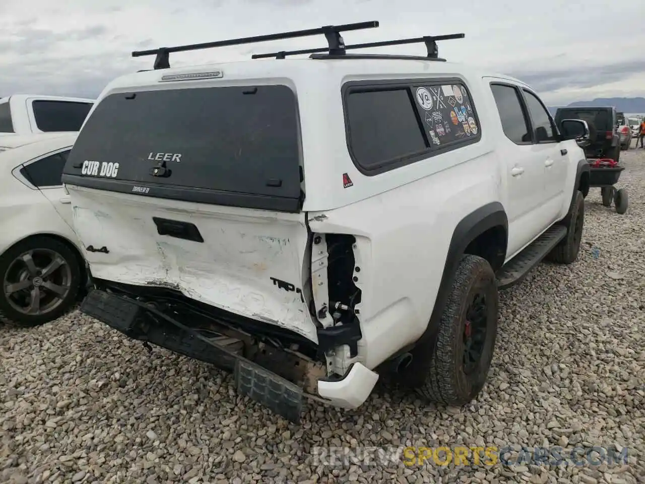 4 Photograph of a damaged car 5TFCZ5AN2KX196446 TOYOTA TACOMA 2019