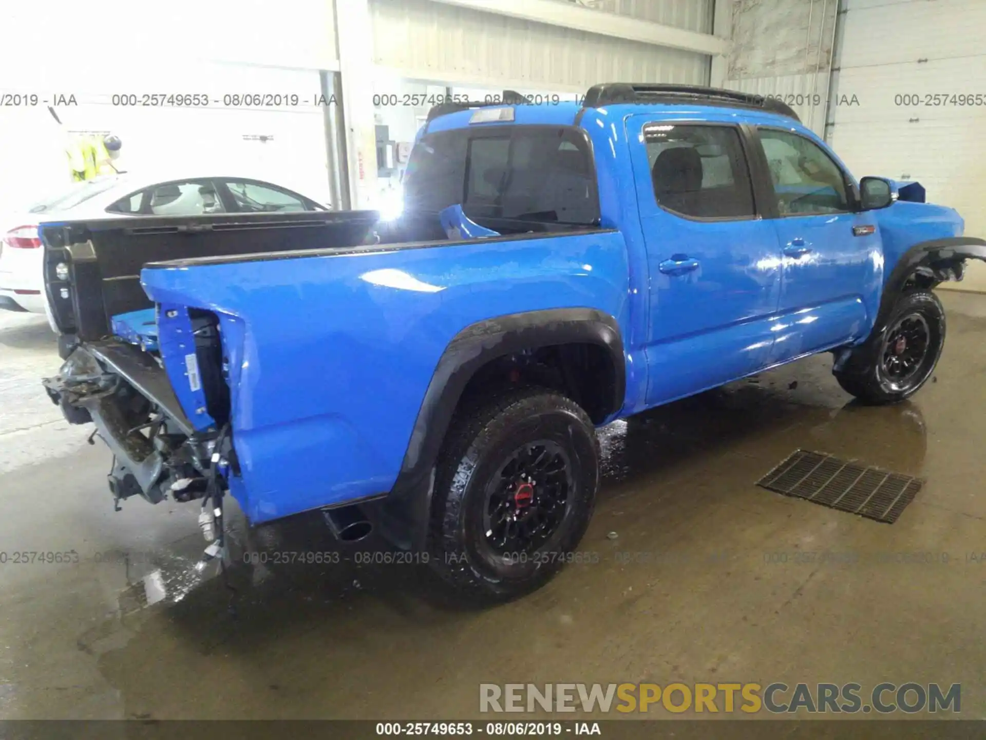 4 Photograph of a damaged car 5TFCZ5AN2KX197273 TOYOTA TACOMA 2019