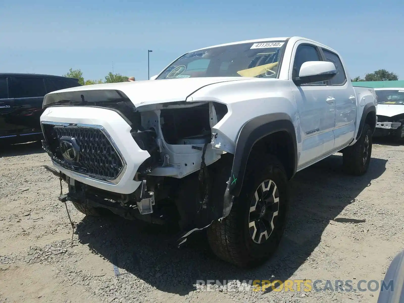 2 Photograph of a damaged car 5TFCZ5AN2KX197791 TOYOTA TACOMA 2019