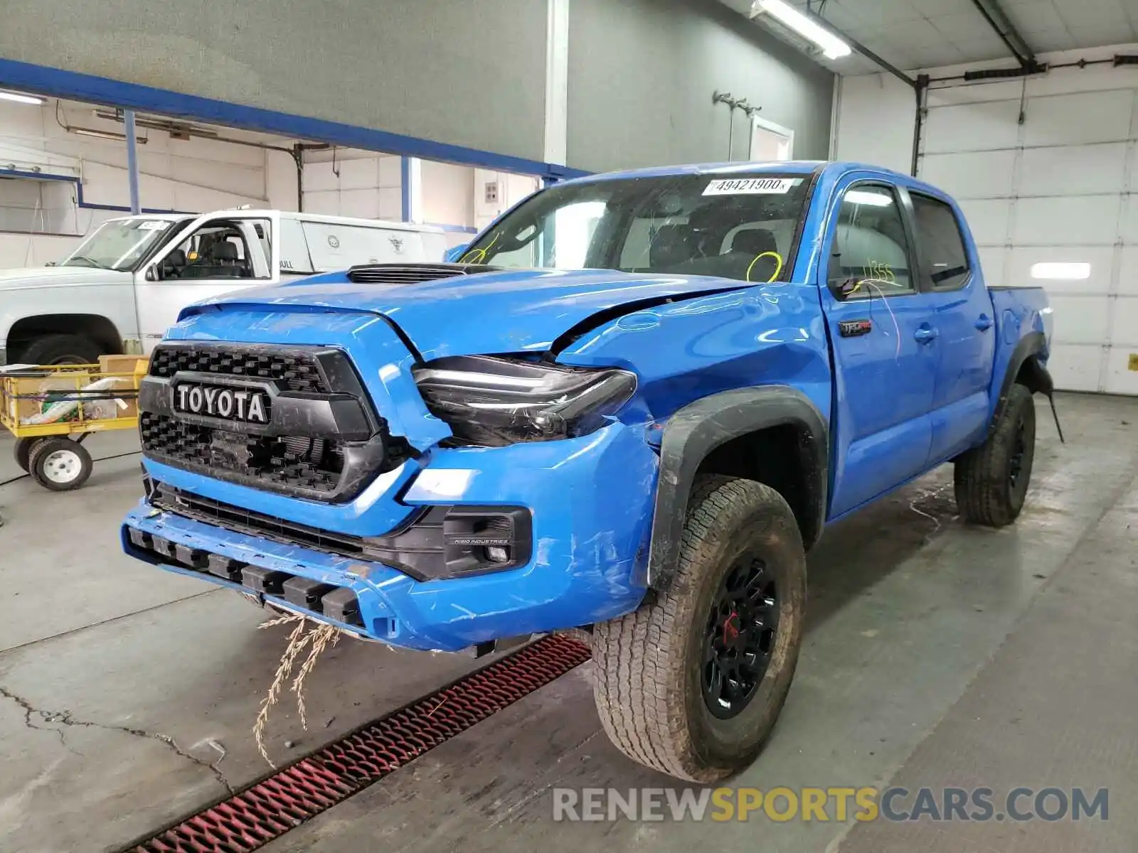 2 Photograph of a damaged car 5TFCZ5AN2KX200947 TOYOTA TACOMA 2019