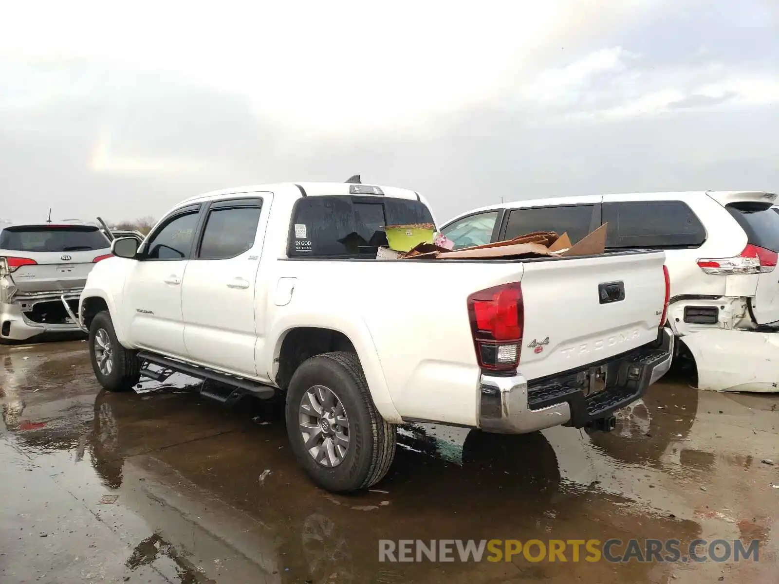 3 Photograph of a damaged car 5TFCZ5AN2KX203833 TOYOTA TACOMA 2019